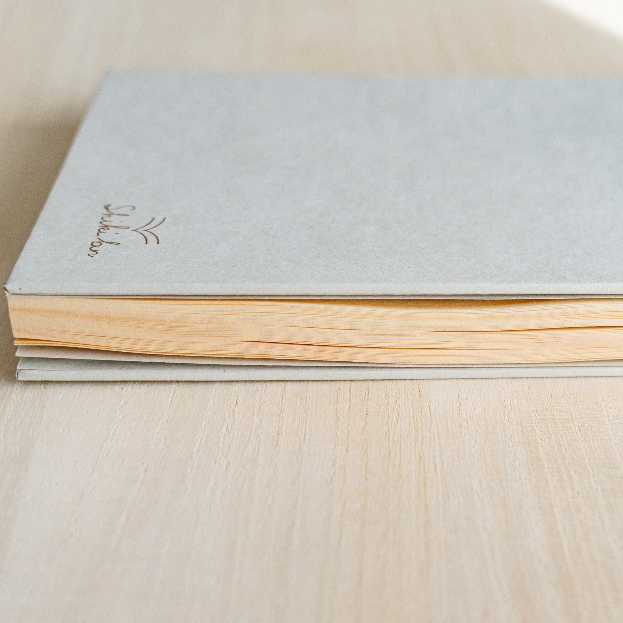 Red Pine wooden page B6 journal, close-up detail of natural grain pattern and finish quality showing natural wood material