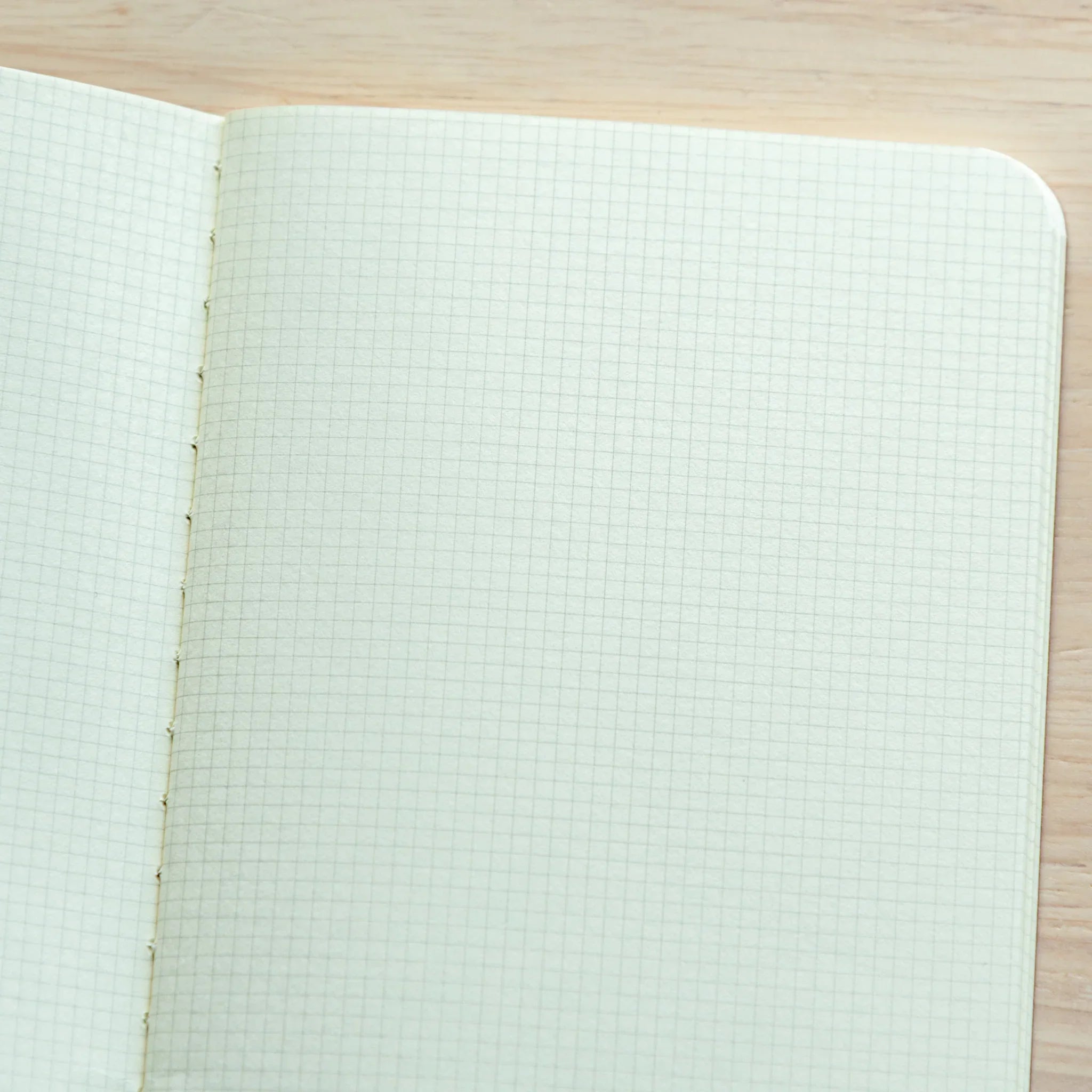 Close-up of 2mm squared Japanese Notebook cover, designed for precision writing with a Japanese Fountain Pen.