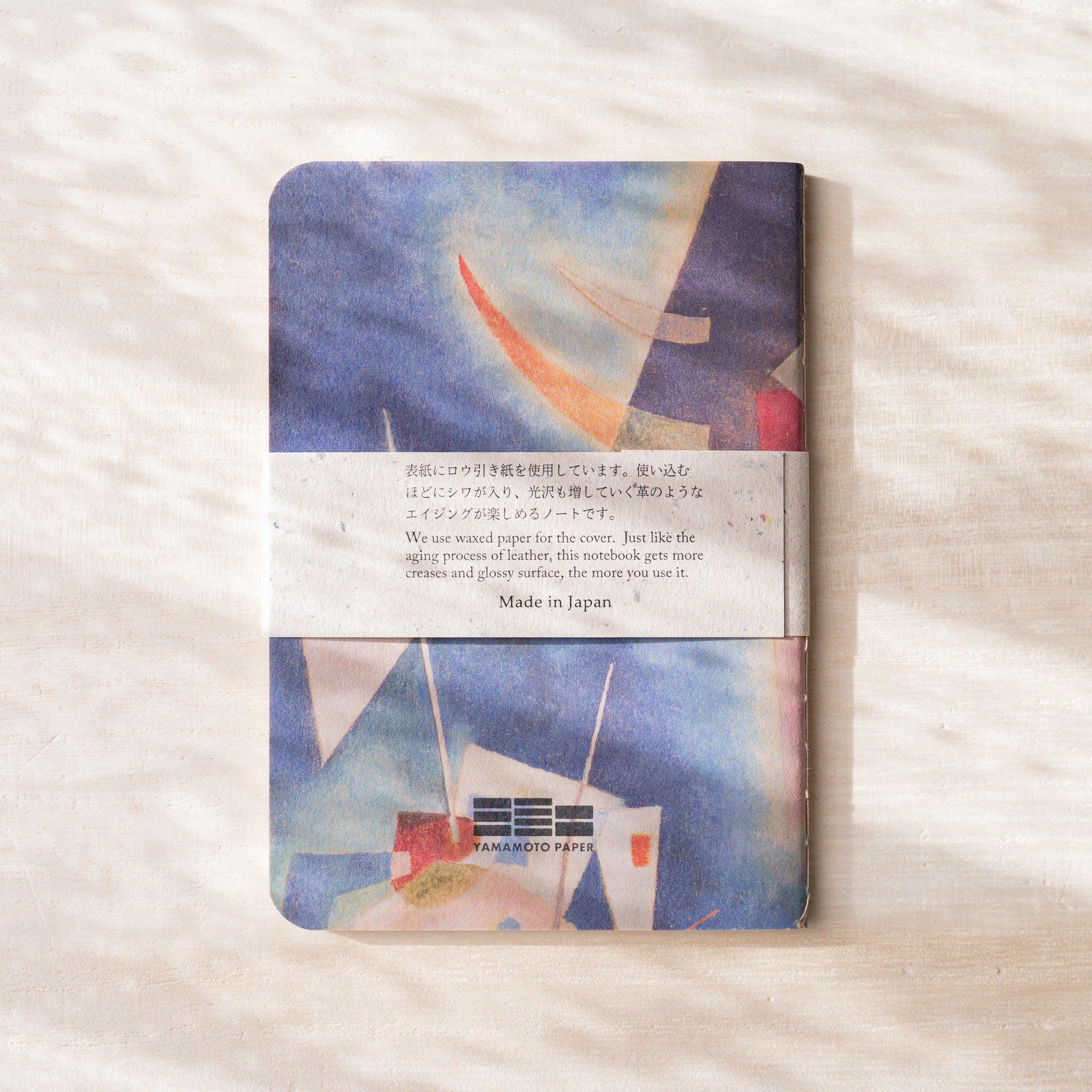 RO-BIKI NOTE back cover with blue abstract geometric painting, paper belly band and Yamamoto Paper logo
