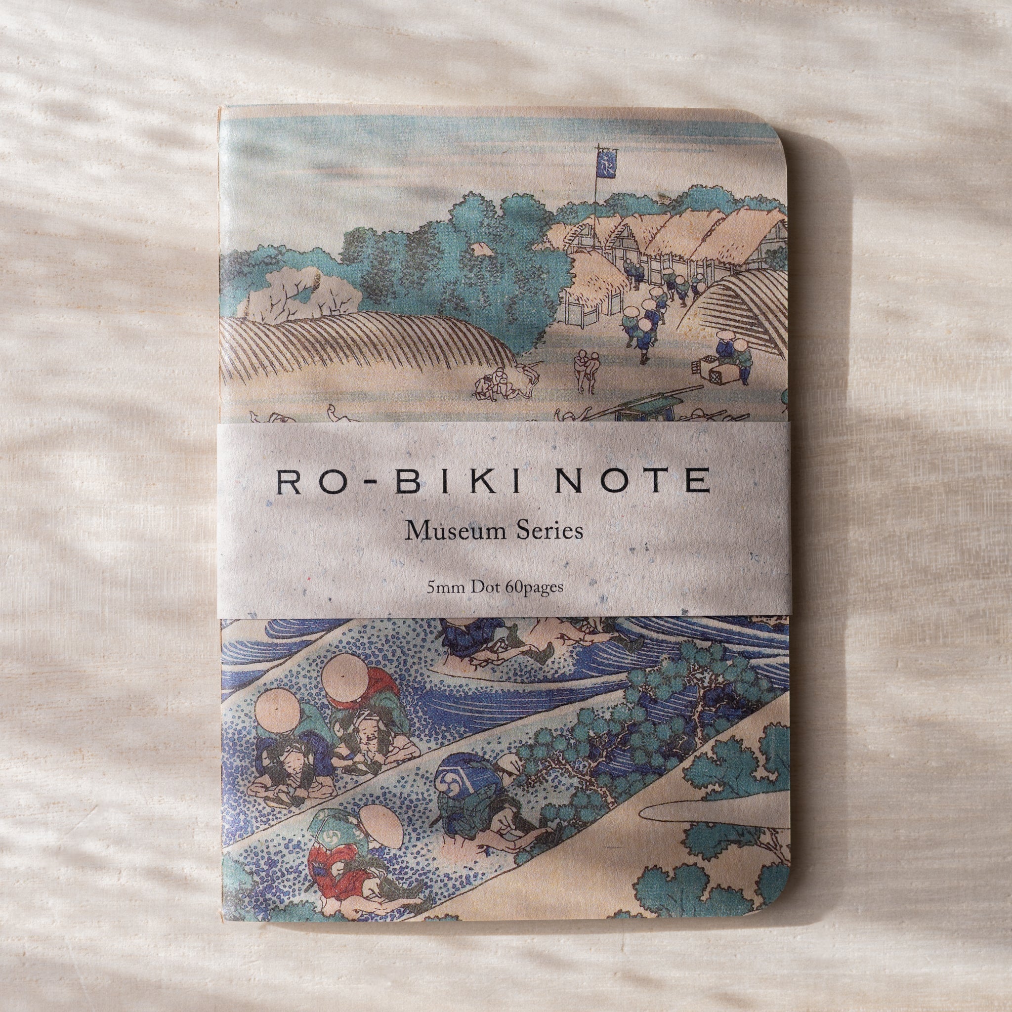 RO-BIKI NOTE Museum Series notebook with Tokaido ukiyo-e woodblock print cover, travelers and post town scene, paper belly band