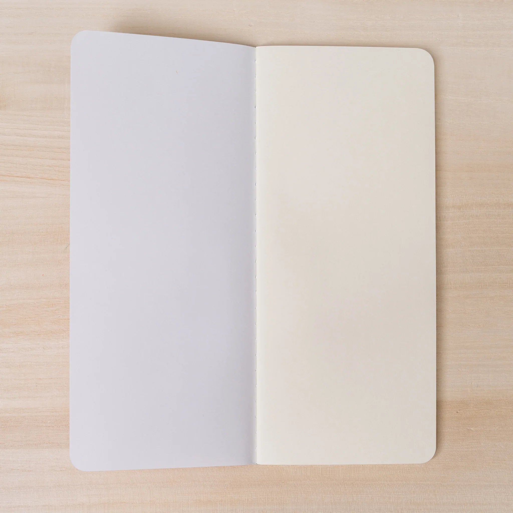 RO-BIKI NOTE Topographical Map notebook open to blank ivory cream pages, New Chiffon Cream paper by Yamamoto Paper