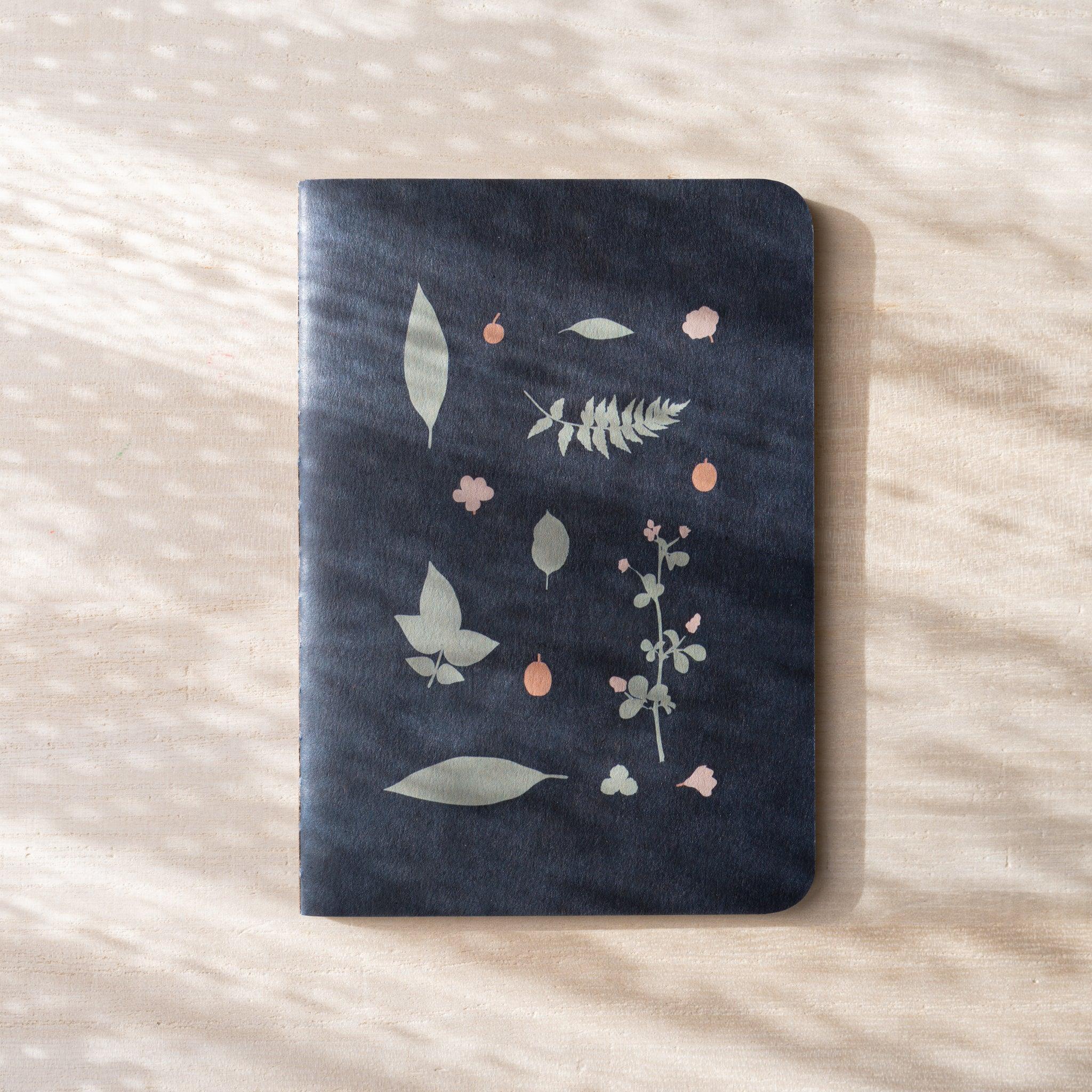 RO-BIKI NOTE Japanese notebook, full navy waxed cover with scattered botanical illustrations, leaves and berries