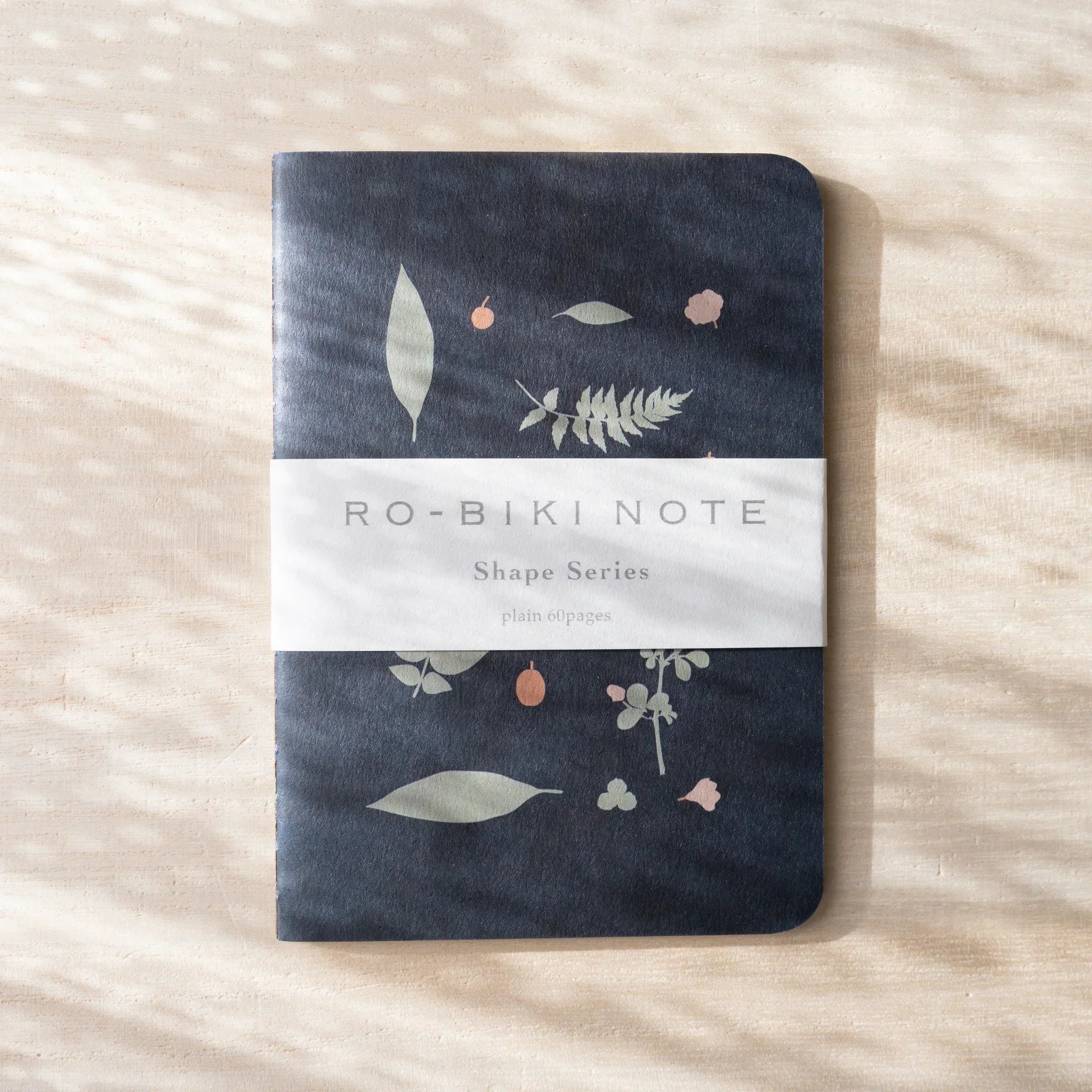 RO-BIKI NOTE Japanese notebook, dark navy waxed cover with botanical illustrations, paper belly band