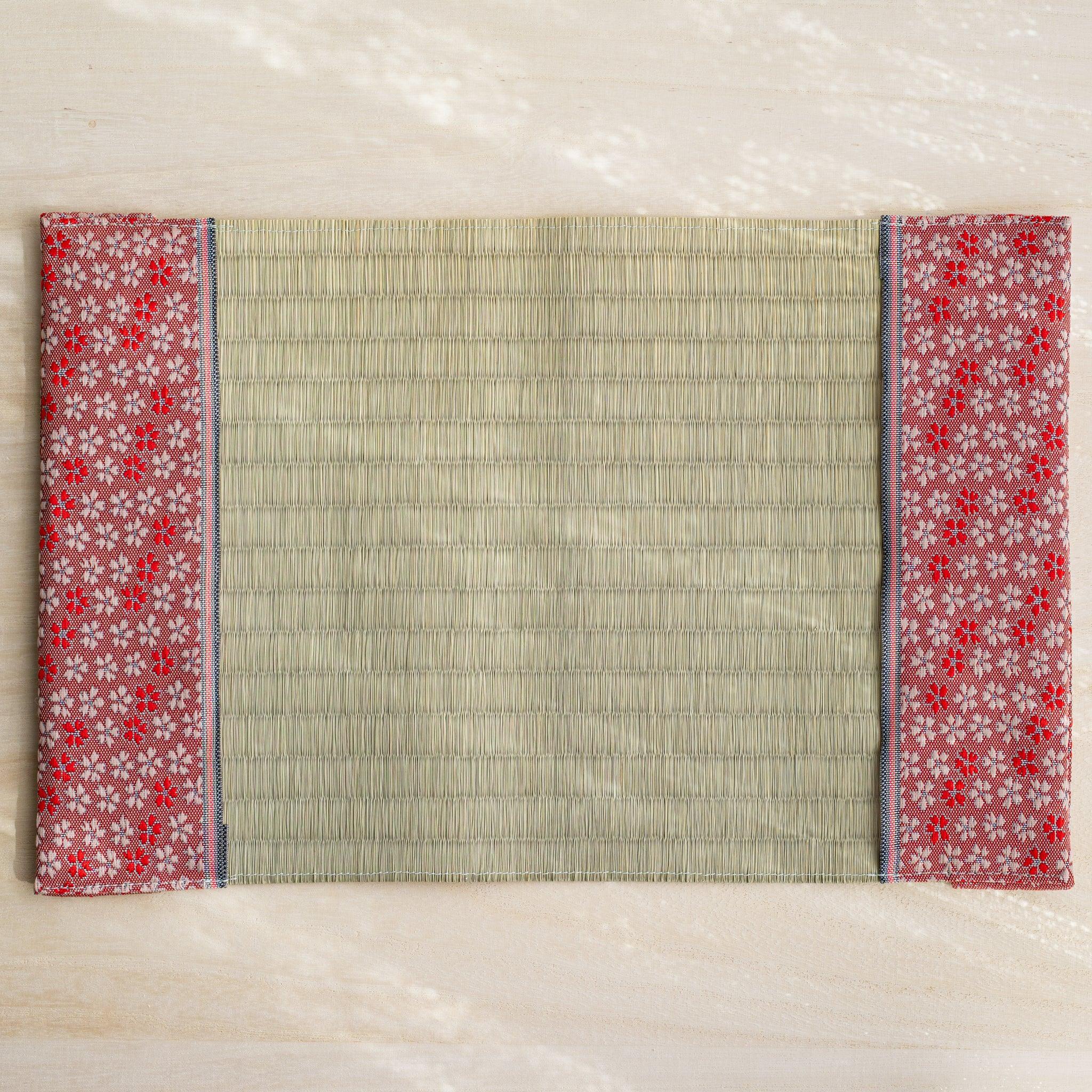 Sakura tatami book cover unfolded flat, inner side up, rush straw center with blossom flaps and blue striped trim