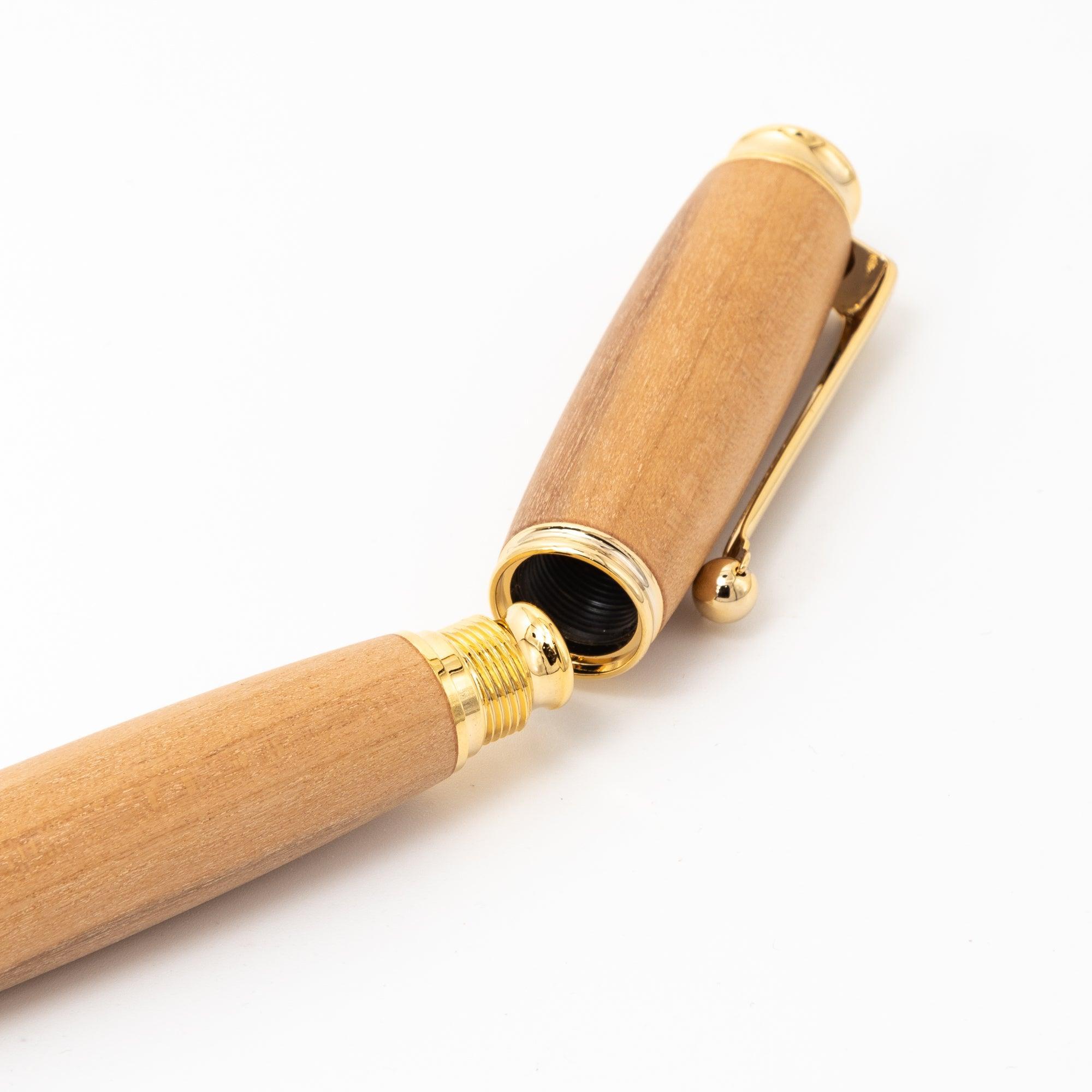 A detailed image of a Japanese fountain pen showing its screw cap mechanism and gold accents, set against a clean white background.