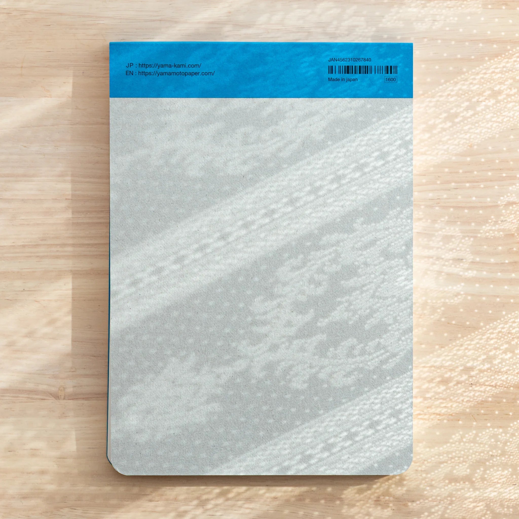 Sanzen Tomoe River Writing Pad A5 back cover view, high-quality Japanese Writing Pad with 200 plain sheets.