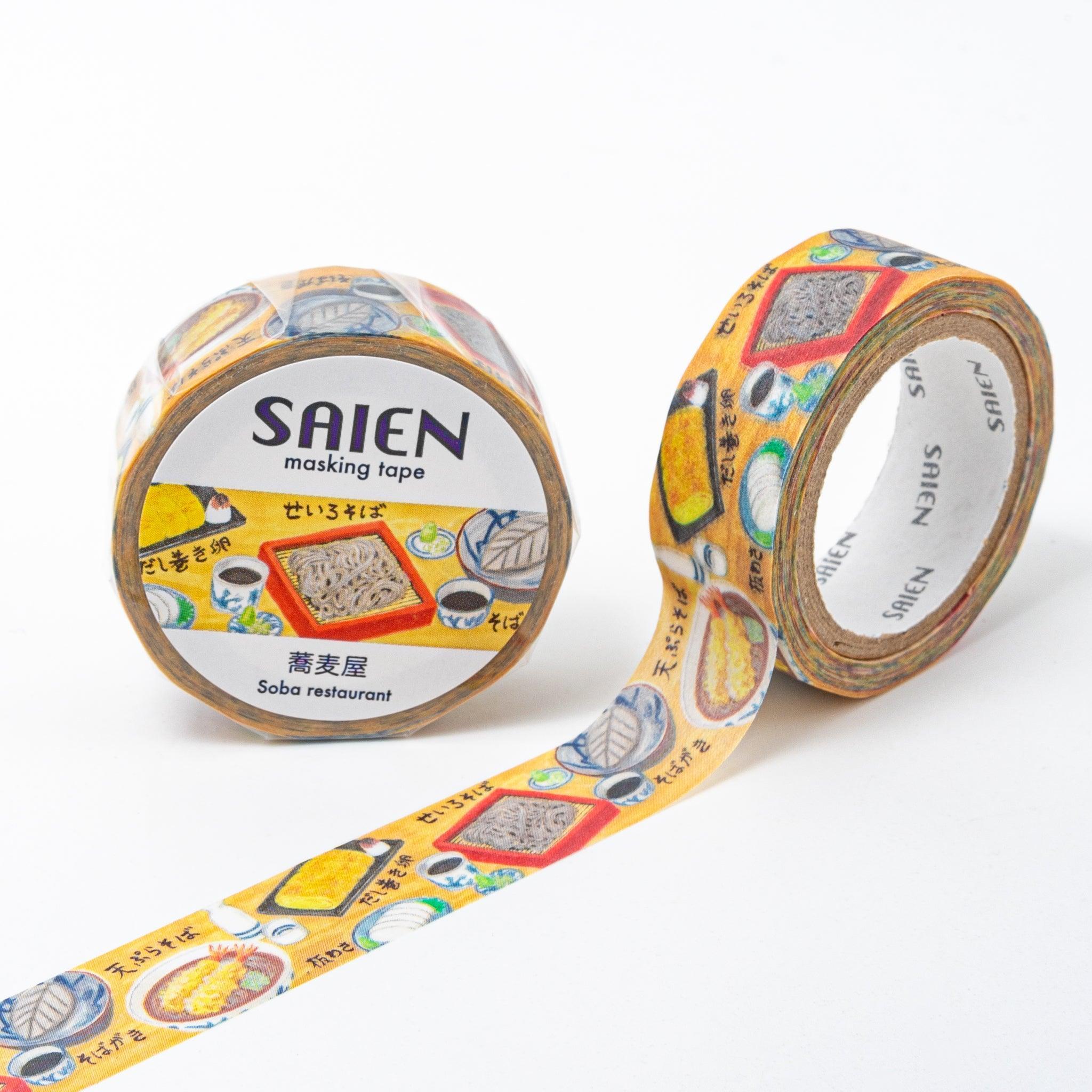 Yellow washi tape from Japanese stationery brand SAIEN, featuring illustrations of soba dishes like zaru soba, tempura soba, and dipping sauces on a bright background.  