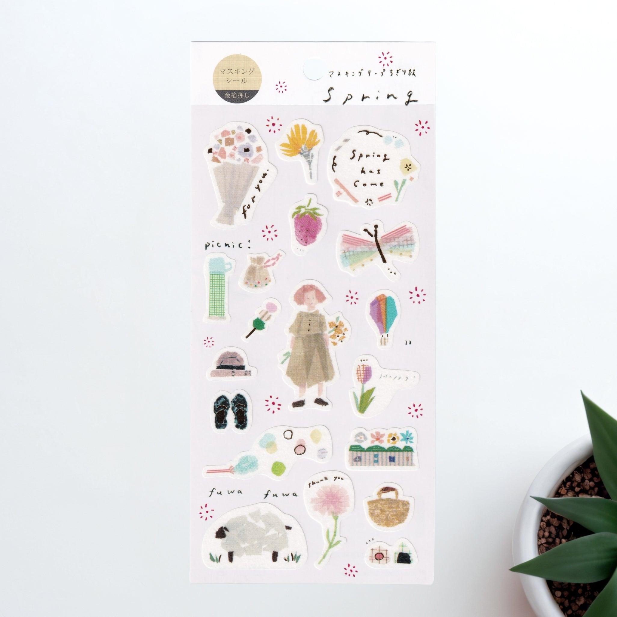 A Japanese stationery washi sticker sheet featuring spring-themed designs, including flowers, a picnic basket, a girl with a bouquet, a butterfly, and seasonal treats, in a soft watercolor style.