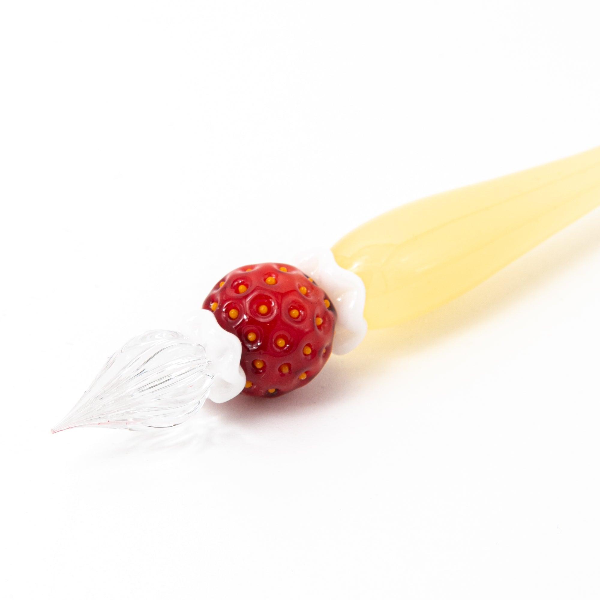 Full view of a strawberry-themed glass pen on a white background. Great for lovers of Japanese stationery.