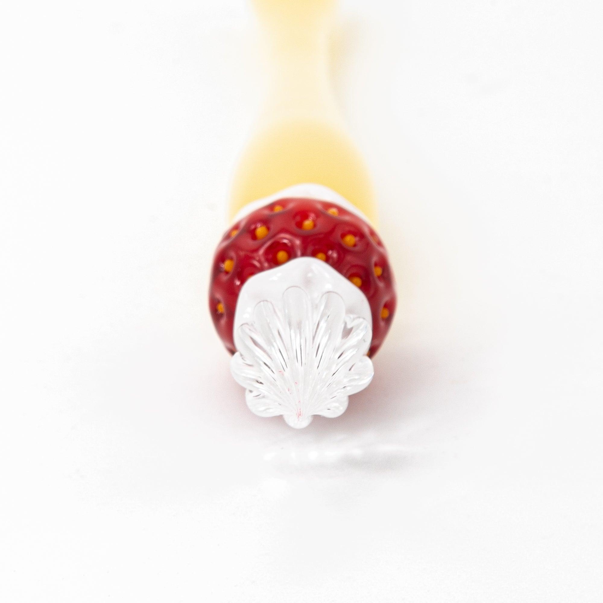 Full view of a strawberry-themed glass pen on a white background. Great for lovers of Japanese stationery.