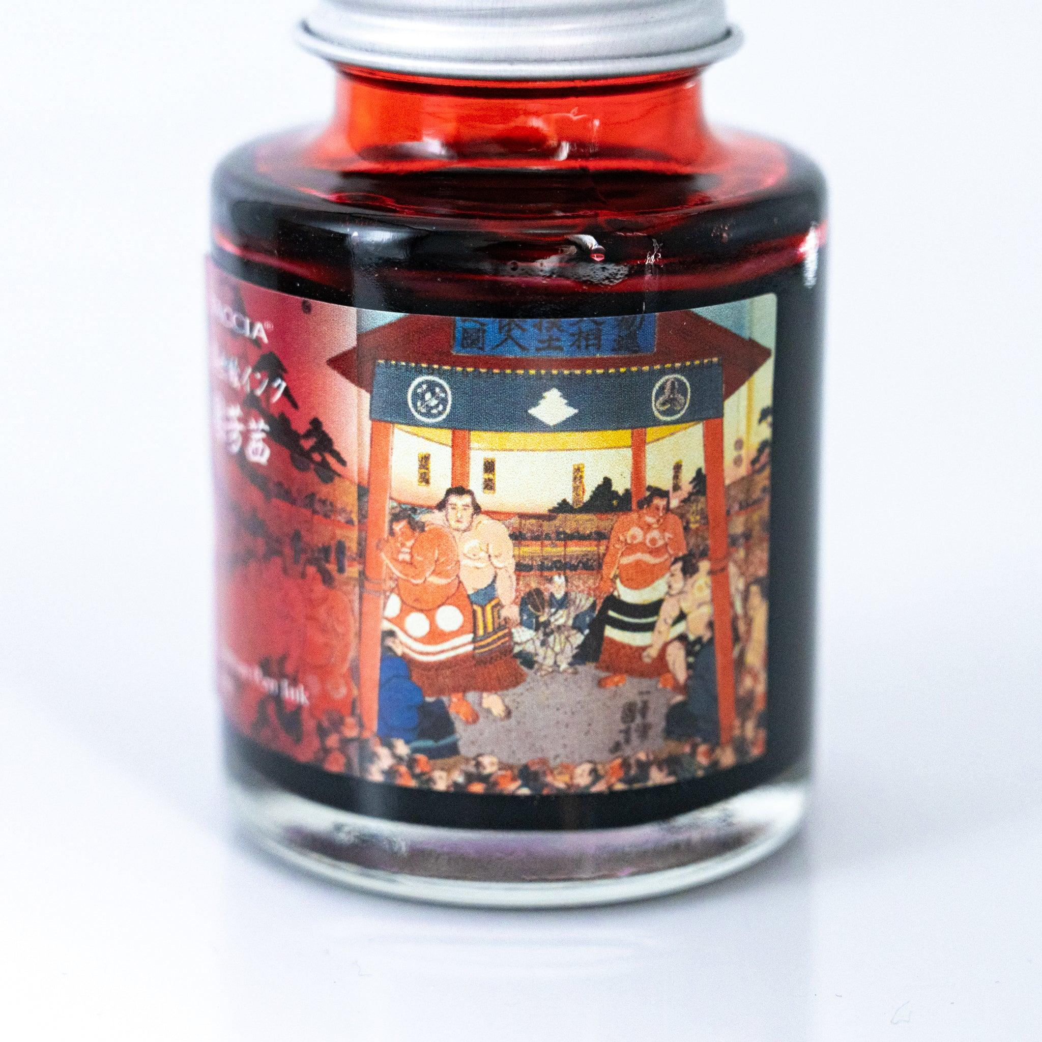 TACCIA Kuniyoshi Akane 40ml Japanese fountain pen ink bottle showing label artwork by Utagawa Kuniyoshi.
