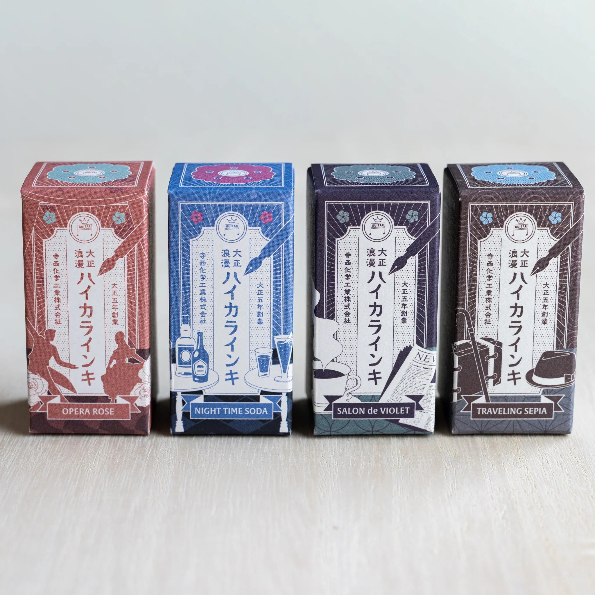 Four illustrated Taisho Romance ink boxes in a row for Opera Rose, Night Time Soda, Salon de Violet and Traveling Sepia