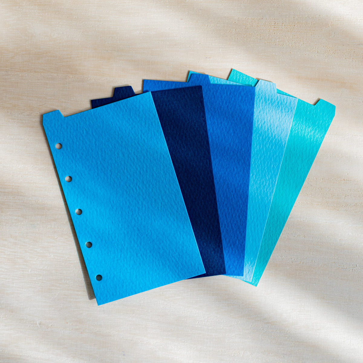Five Mermaid M5 dividers fanned in sky blue, navy, cobalt, pale blue and turquoise with top tabs