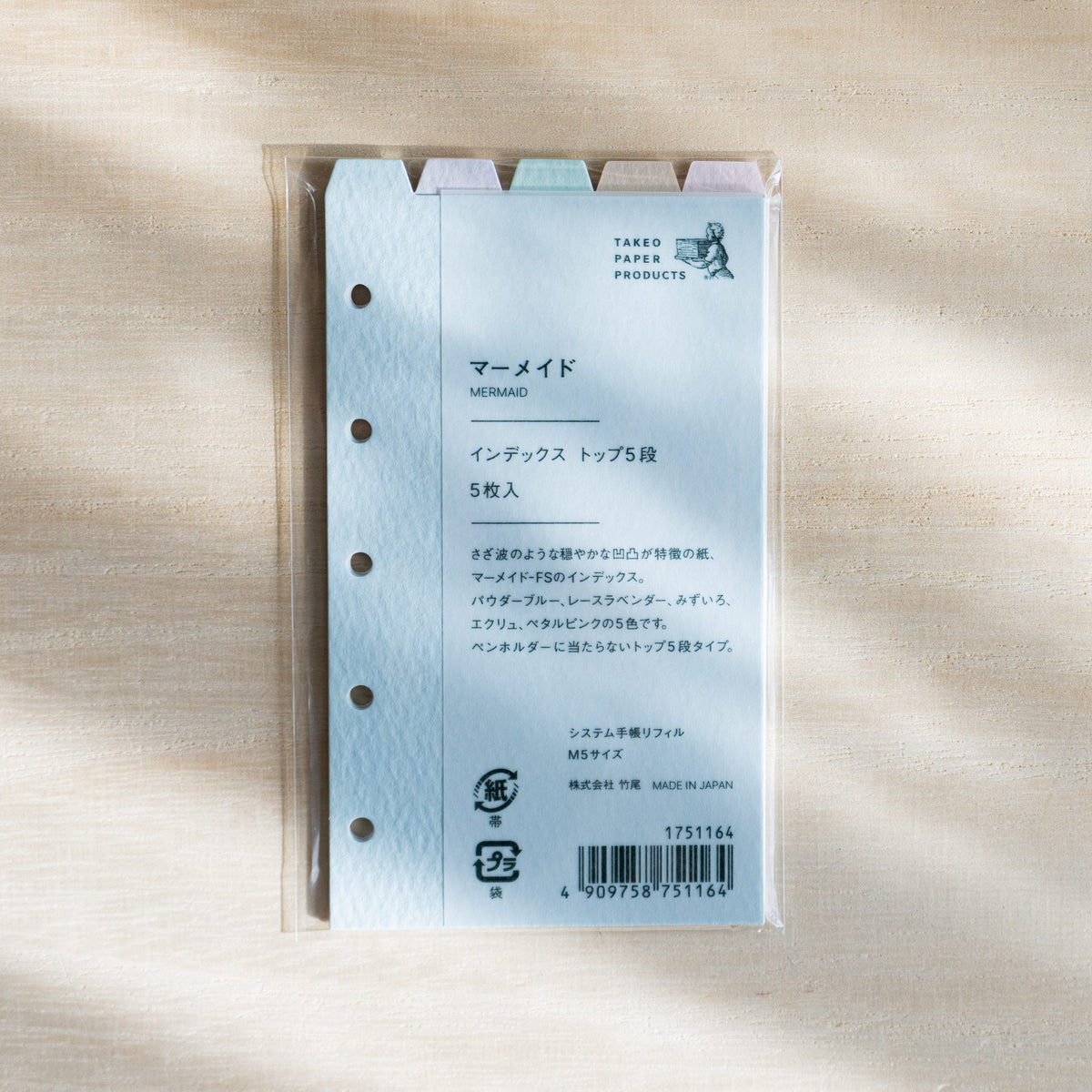 TAKEO Mermaid M5 top-tab index dividers in a plastic sleeve, pastel tabs above the Japanese label