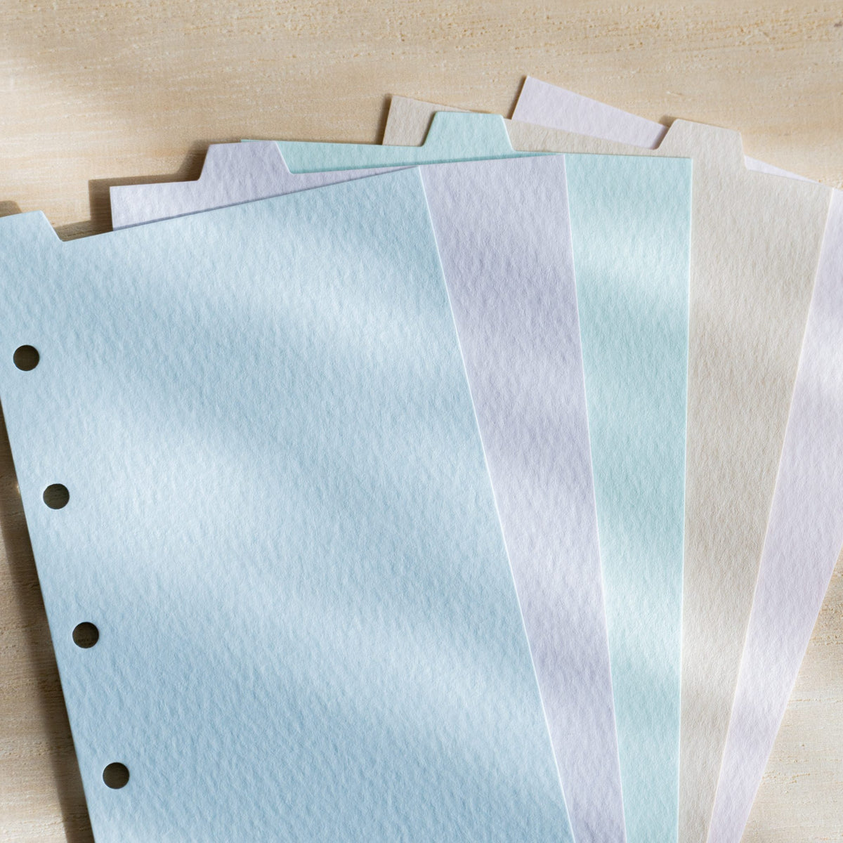 Close-up of Mermaid index dividers showing the rippled felt-mark texture in five pastel colors