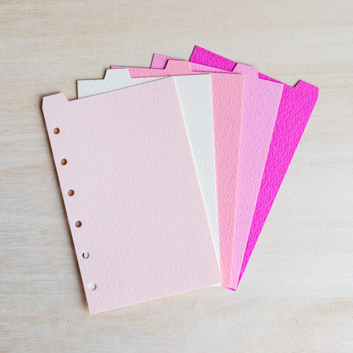 Five Mermaid Mini 6 dividers fanned in pale pink, natural, coral, rose and cosmos pink with top tabs