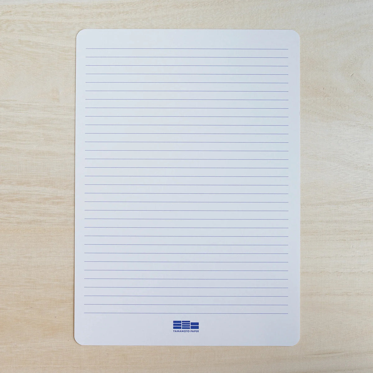 Yamamoto Paper ruled guide sheet with blue horizontal lines, included with Tateyama A4 paper