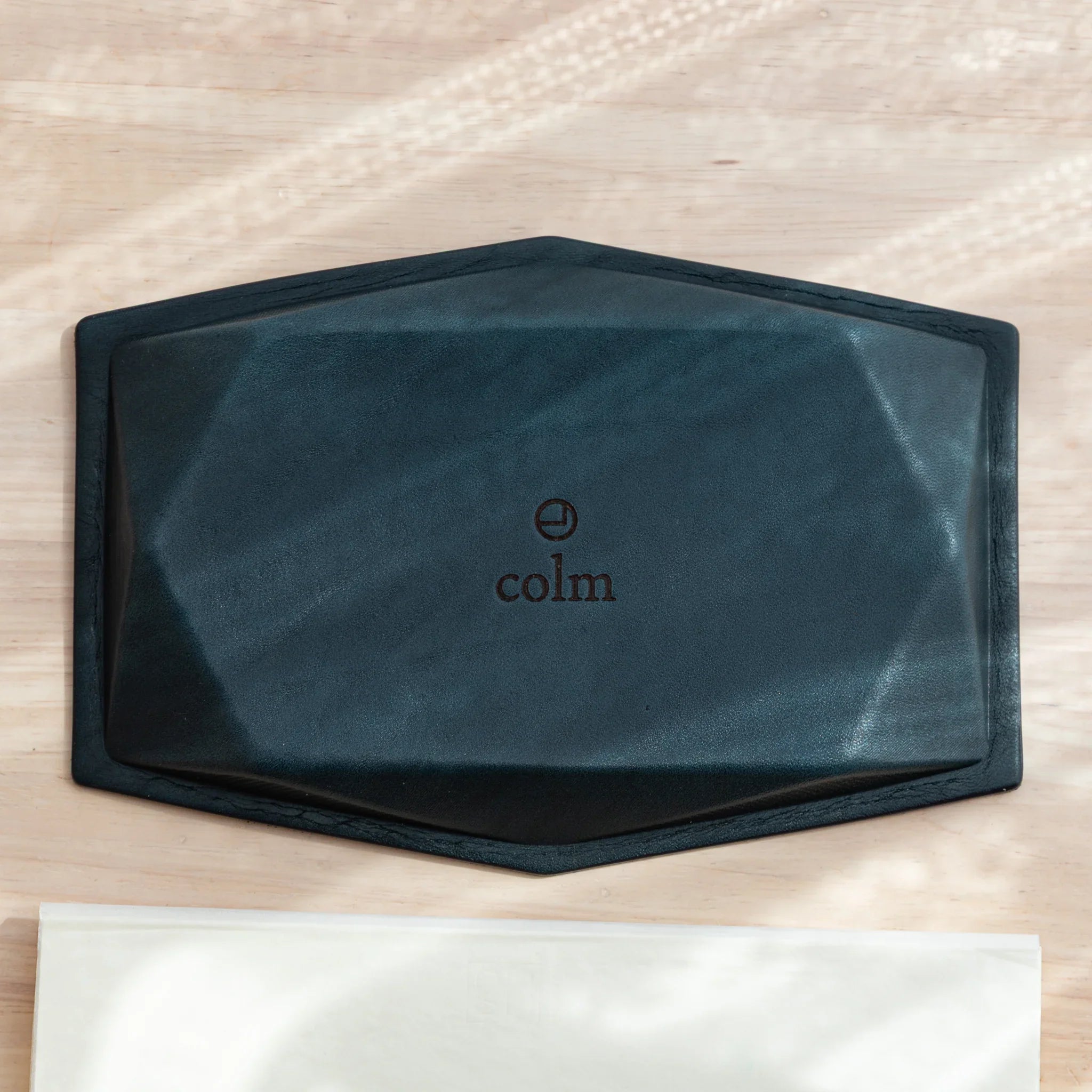 Flat view of the bottom of the Japanese Pen Tray with embossed colm logo.