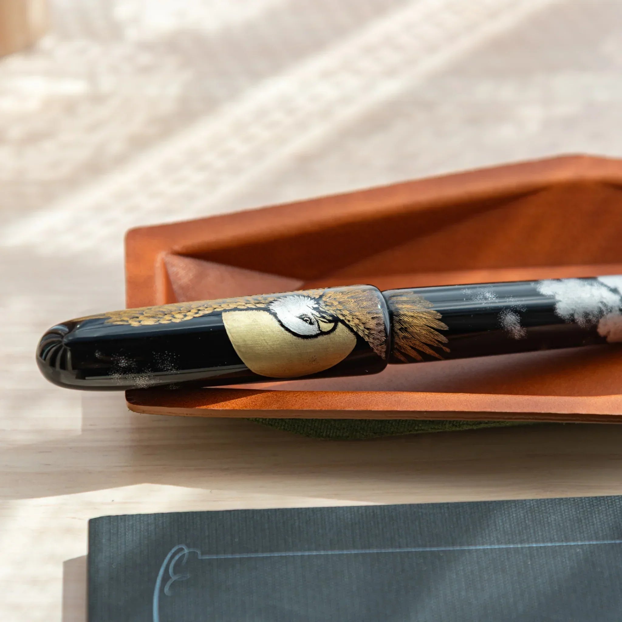 Close-up of Japanese Fountain Pen inside Camel leather Japanese Pen Tray.