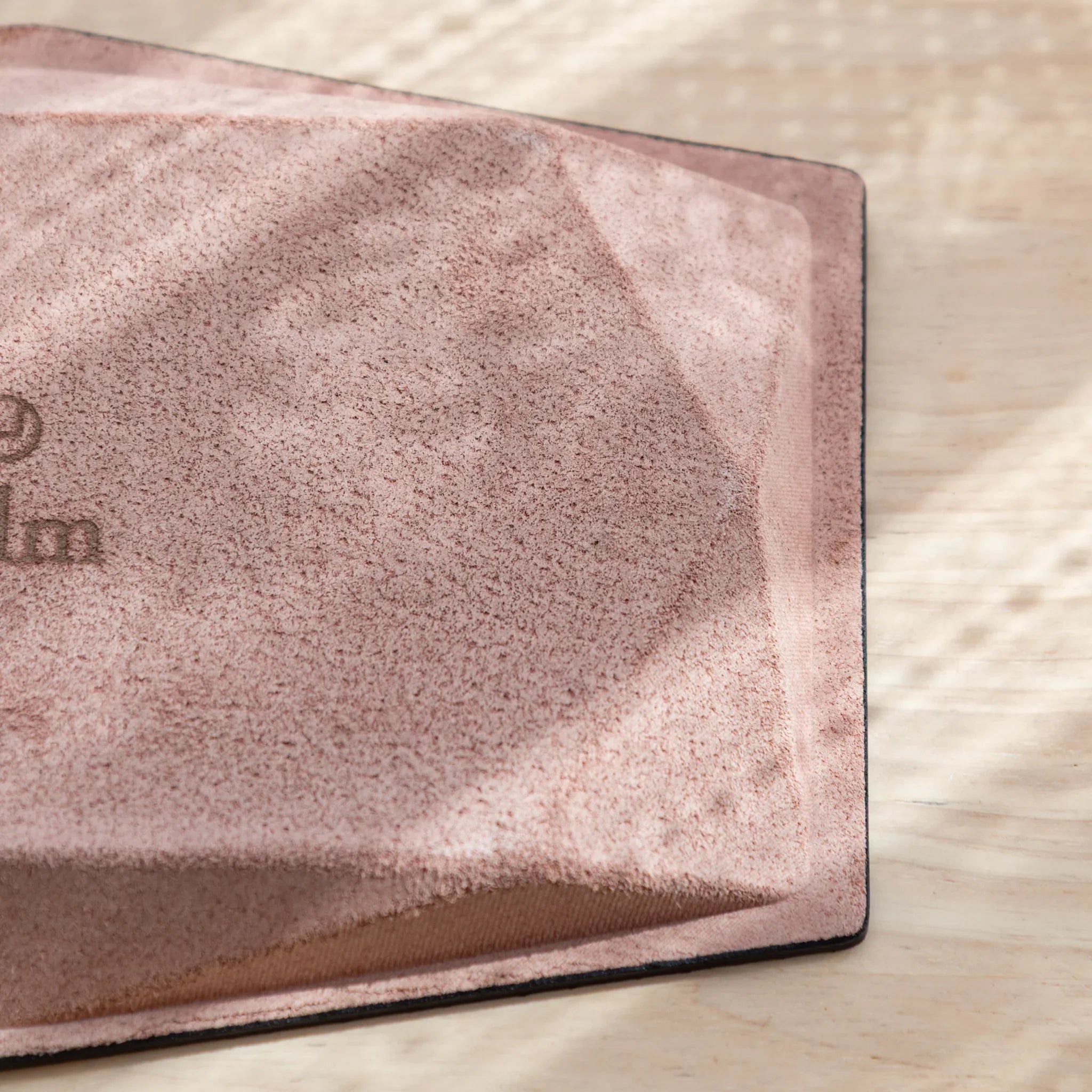 Detailed view of the suede corner on the underside of the Japanese Pen Tray.