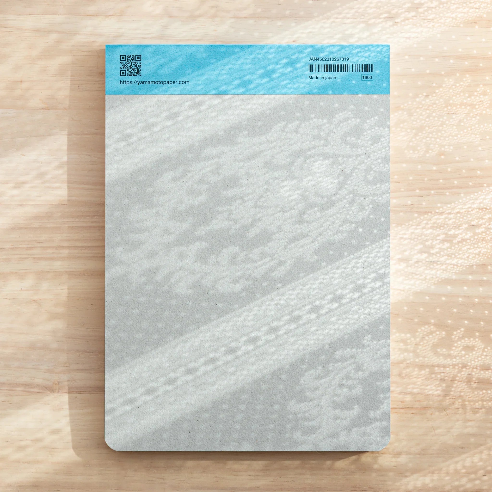 Full backside view of Tomoegawa Tomoe River Writing Pad A5, Japanese Note Book with smooth lightweight fountain pen paper.