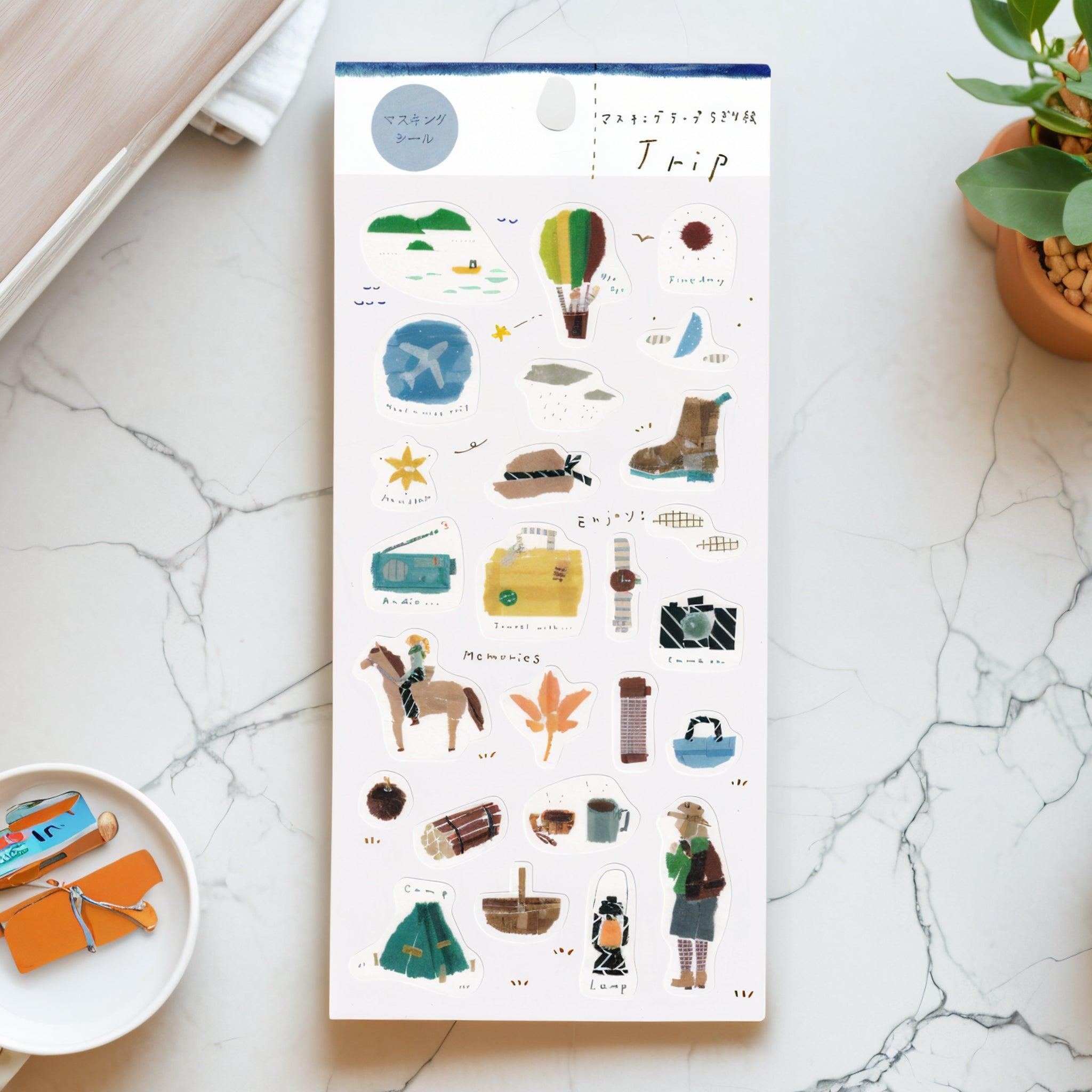 A Japanese stationery washi sticker sheet featuring travel and adventure-themed designs, including a hot air balloon, suitcase, boots, camera, and camping gear, in a rustic watercolor style.