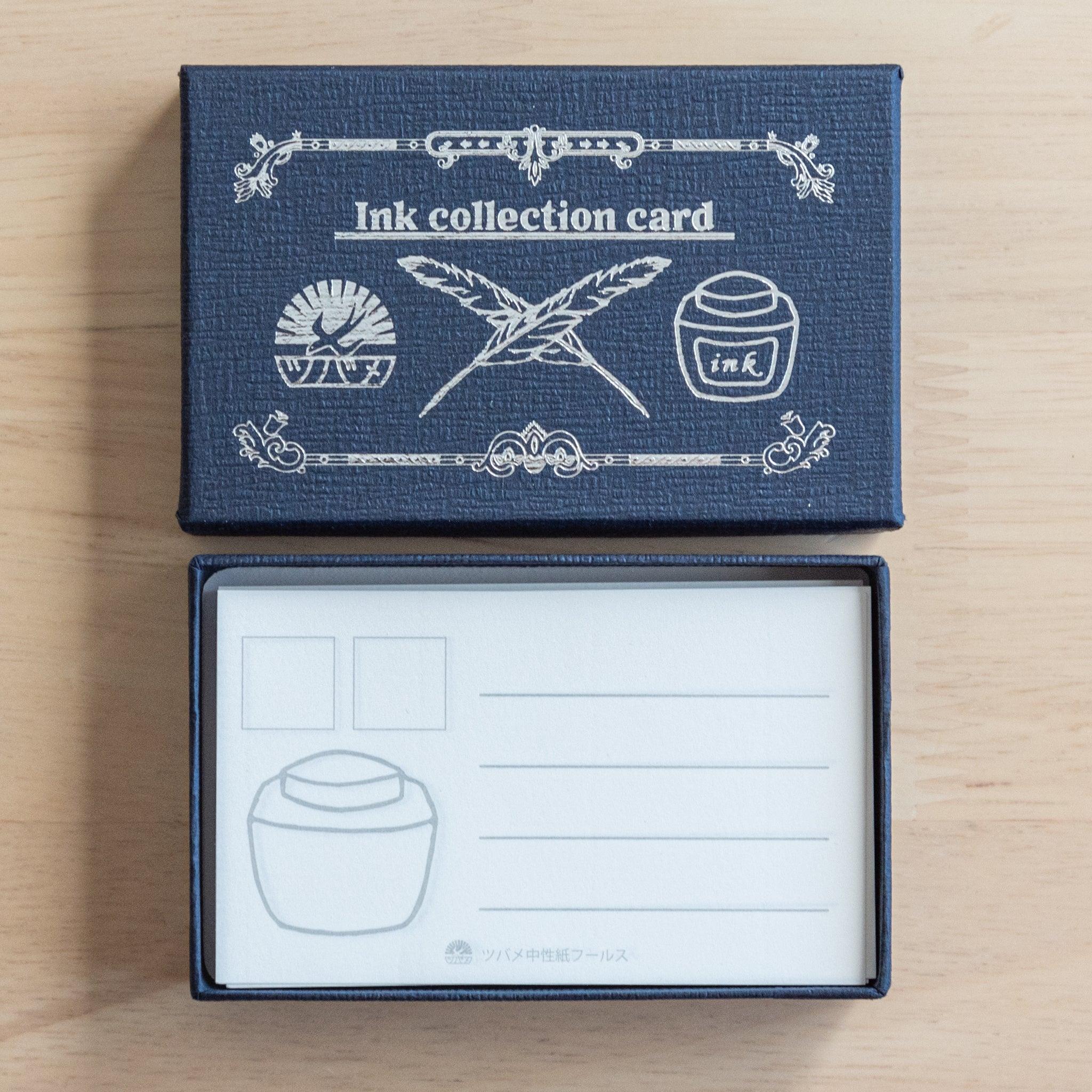 A navy Tsubame Japanese stationery box labeled "Ink collection card," opened to display blank color swatch cards with designated spaces for ink samples and notes.  