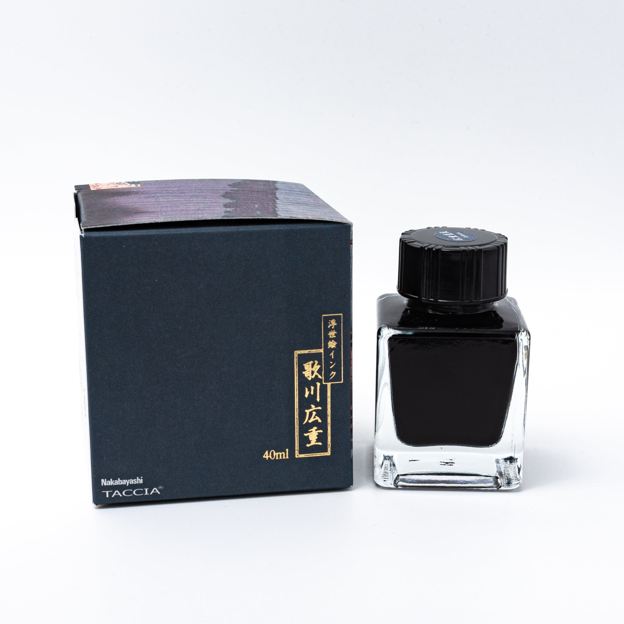 Japanese stationery fountain pen ink. The packaging features Ukiyo-e style art of a rainy bridge scene. The glass bottle contains 40ml of blue-gray "Ainezu" ink.  