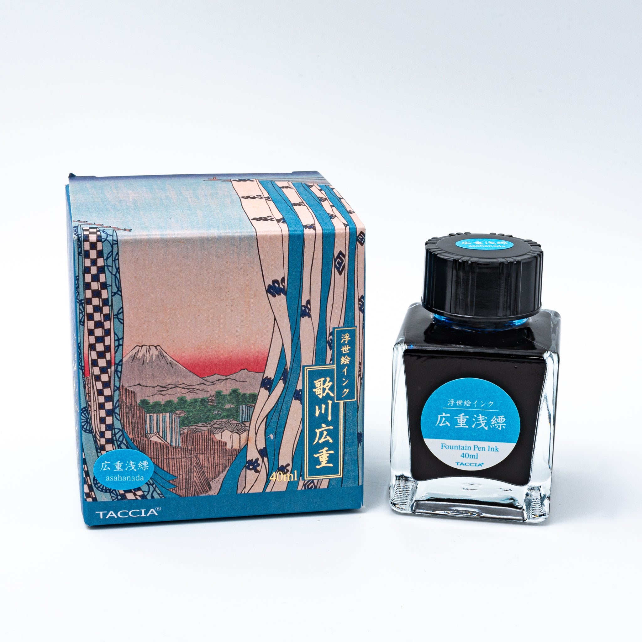 Japanese stationery fountain pen ink. The packaging features Ukiyo-e style art of Mount Fuji with blue curtains in the foreground. The glass bottle contains 40ml of light blue "Asahanada" ink.  