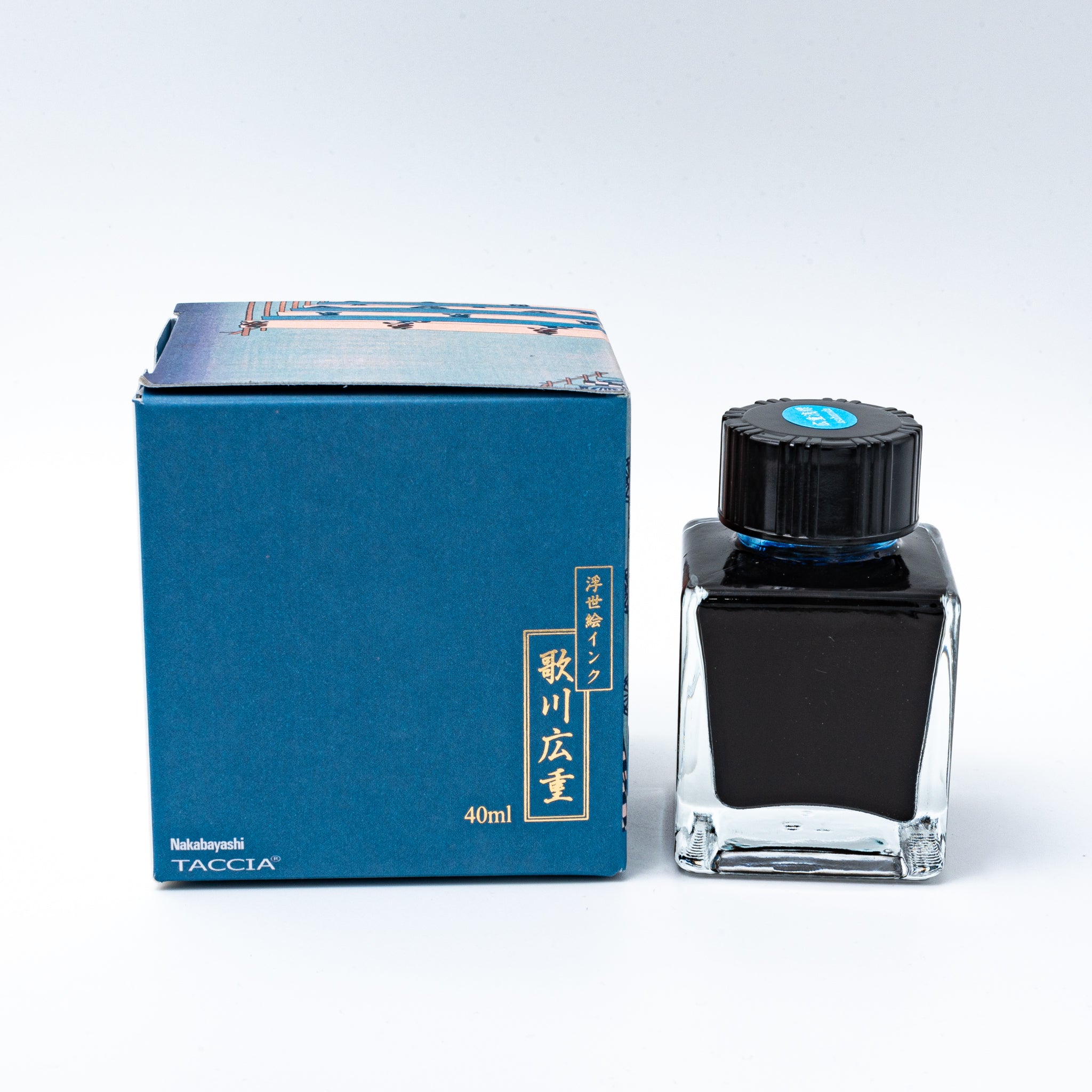 Japanese stationery fountain pen ink. The packaging features Ukiyo-e style art of Mount Fuji with blue curtains in the foreground. The glass bottle contains 40ml of light blue "Asahanada" ink.  