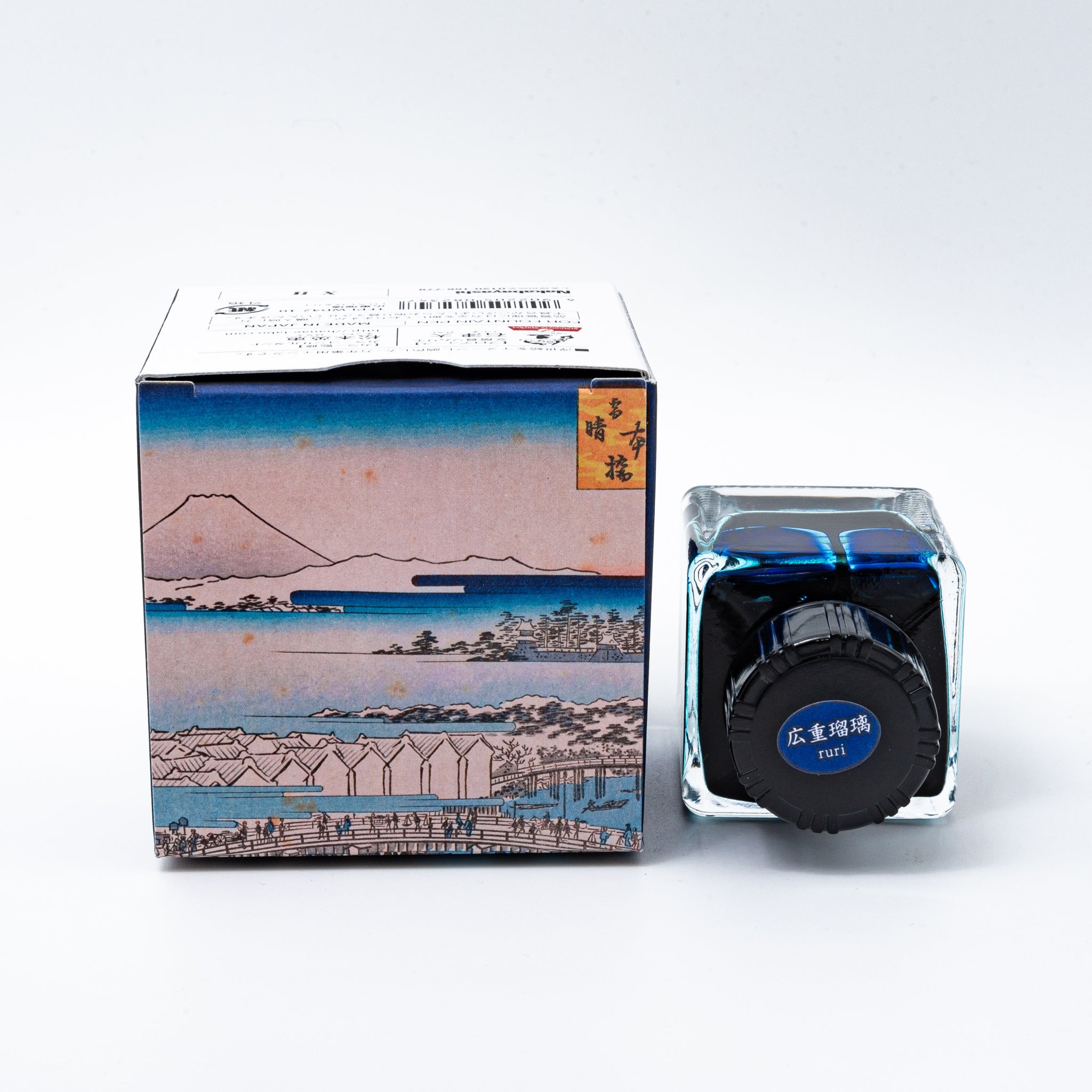 Japanese stationery fountain pen ink. The packaging features Ukiyo-e style art of a river scene with boats and a bridge. The glass bottle contains 40ml of blue "Furi" ink.  