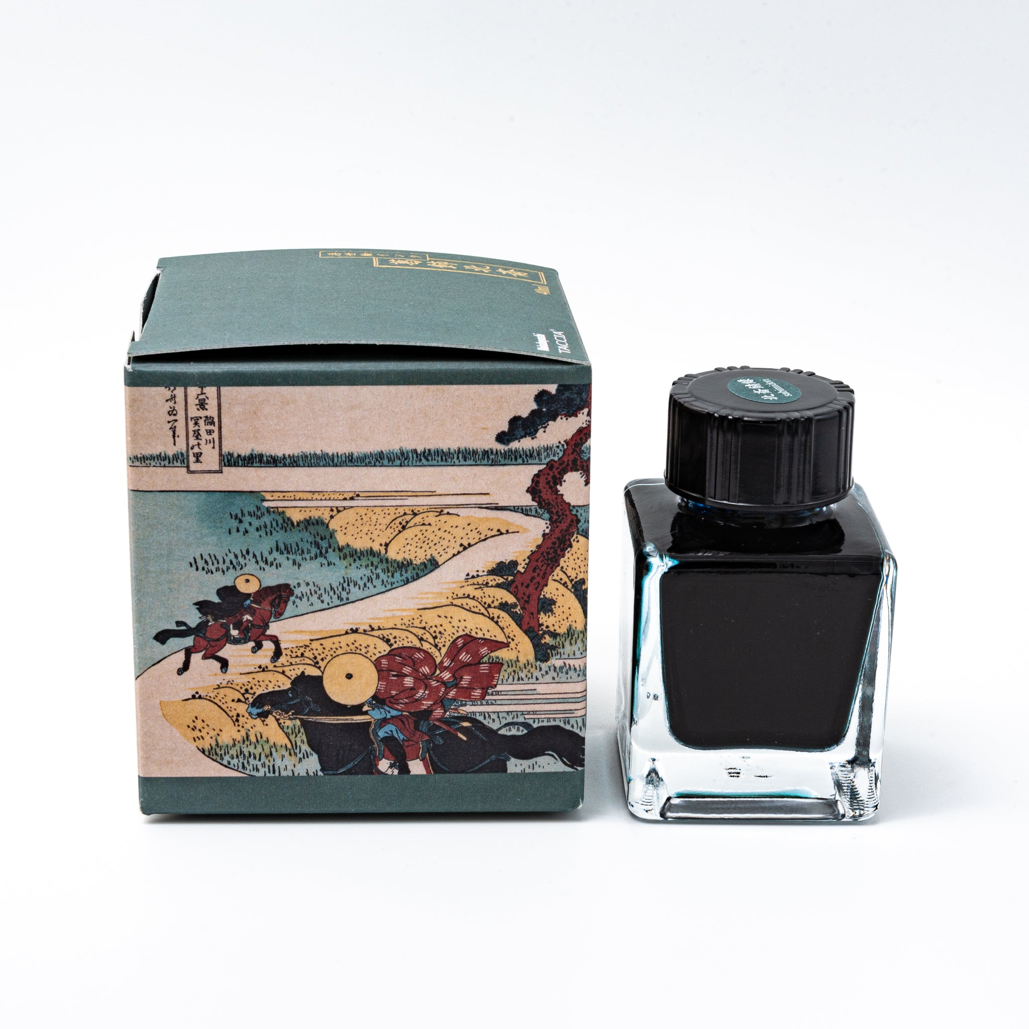 Japanese stationery fountain pen ink. The packaging features Ukiyo-e style art of a rural landscape with Mount Fuji. The glass bottle contains 40ml of teal "Sabimidori" ink.  