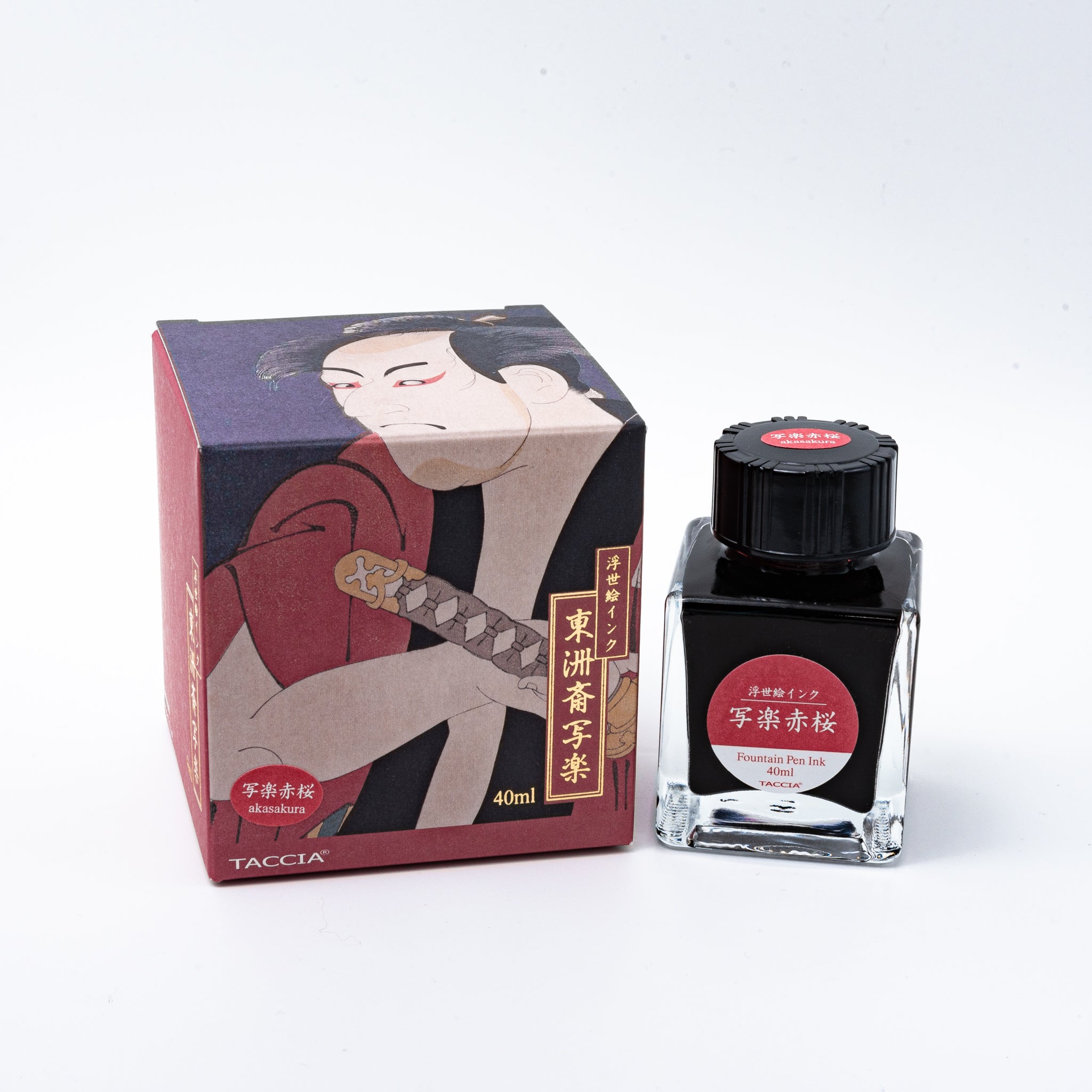 Japanese stationery fountain pen ink. The packaging features Ukiyo-e style art of a kabuki actor in a red kimono. The glass bottle contains 40ml of reddish-brown "Akasakura" ink.  