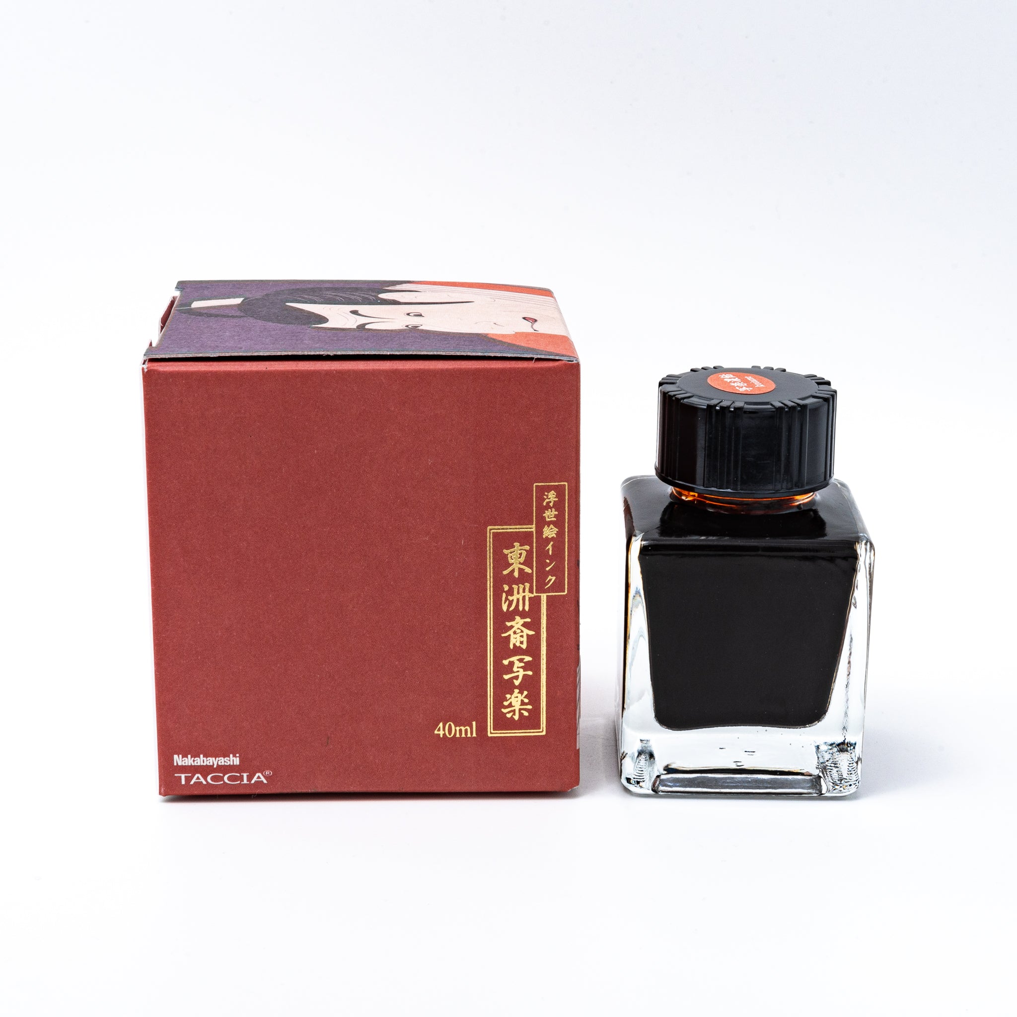 Japanese stationery fountain pen ink. The packaging features Ukiyo-e style art of a kabuki actor in a red kimono. The glass bottle contains 40ml of brown "Koiame" ink.  