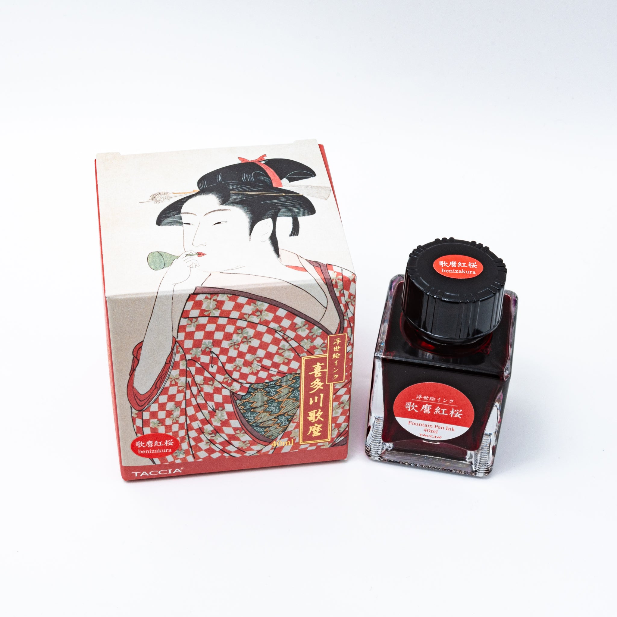 Japanese stationery fountain pen ink. The packaging features Ukiyo-e style art of a woman in a red checkered kimono. The glass bottle contains 40ml of red "Benizakura" ink.  