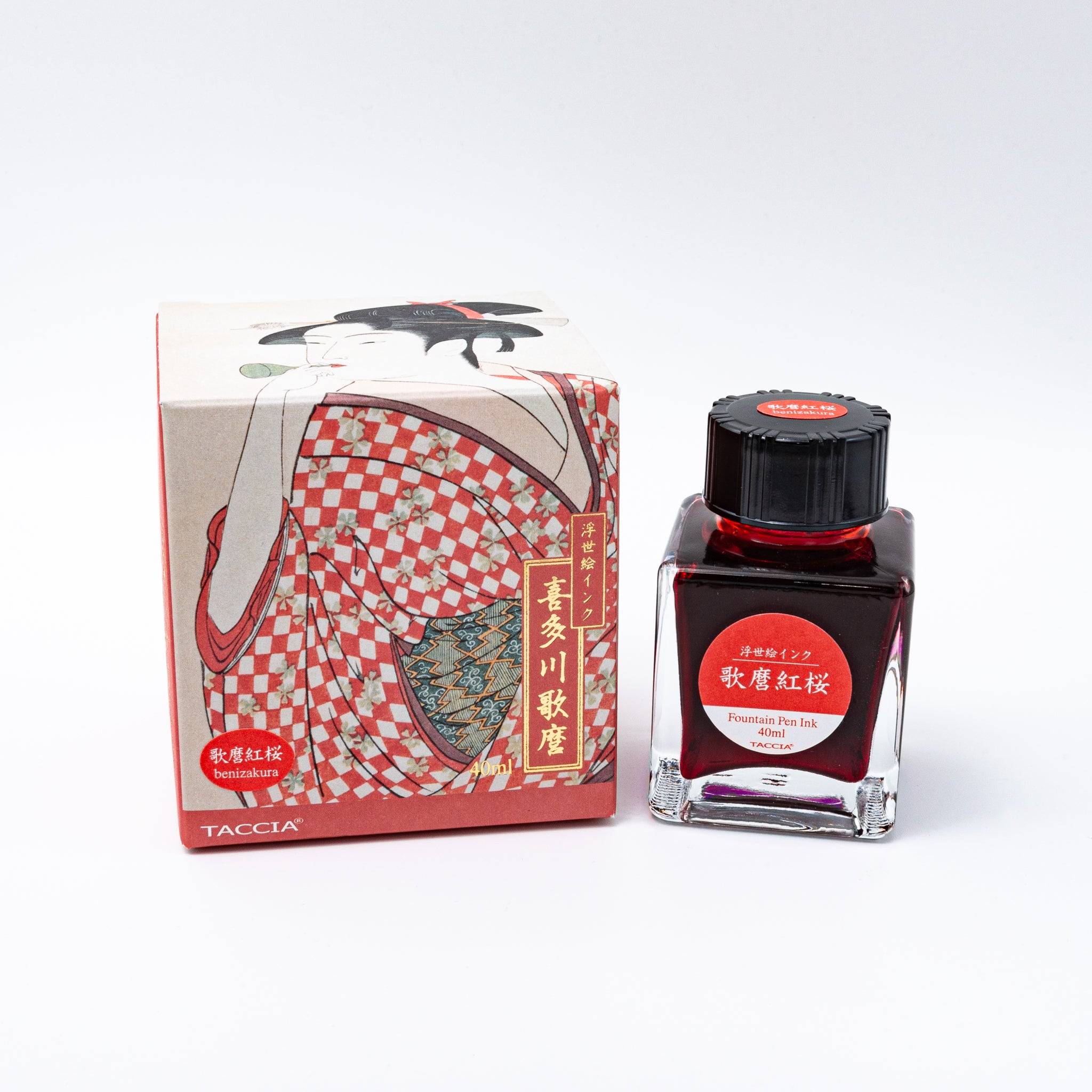 Japanese stationery fountain pen ink. The packaging features Ukiyo-e style art of a woman in a red checkered kimono. The glass bottle contains 40ml of red "Benizakura" ink.  