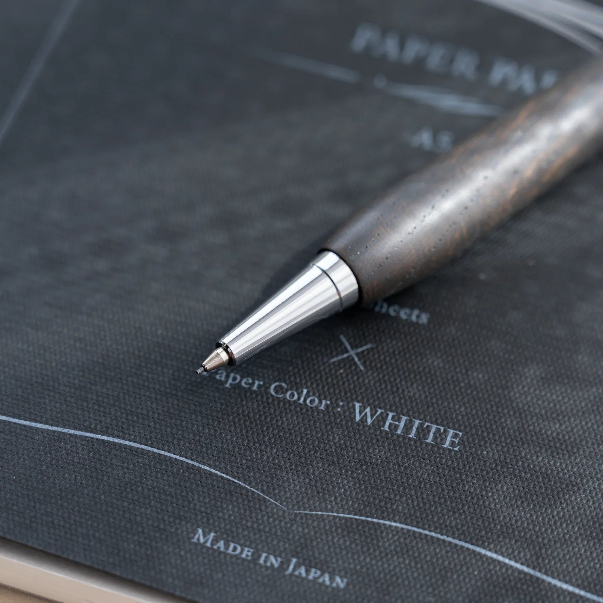 Zelkova wood urushi lacquered mechanical pencil in charcoal black, Japanese keyaki wood, full-body view