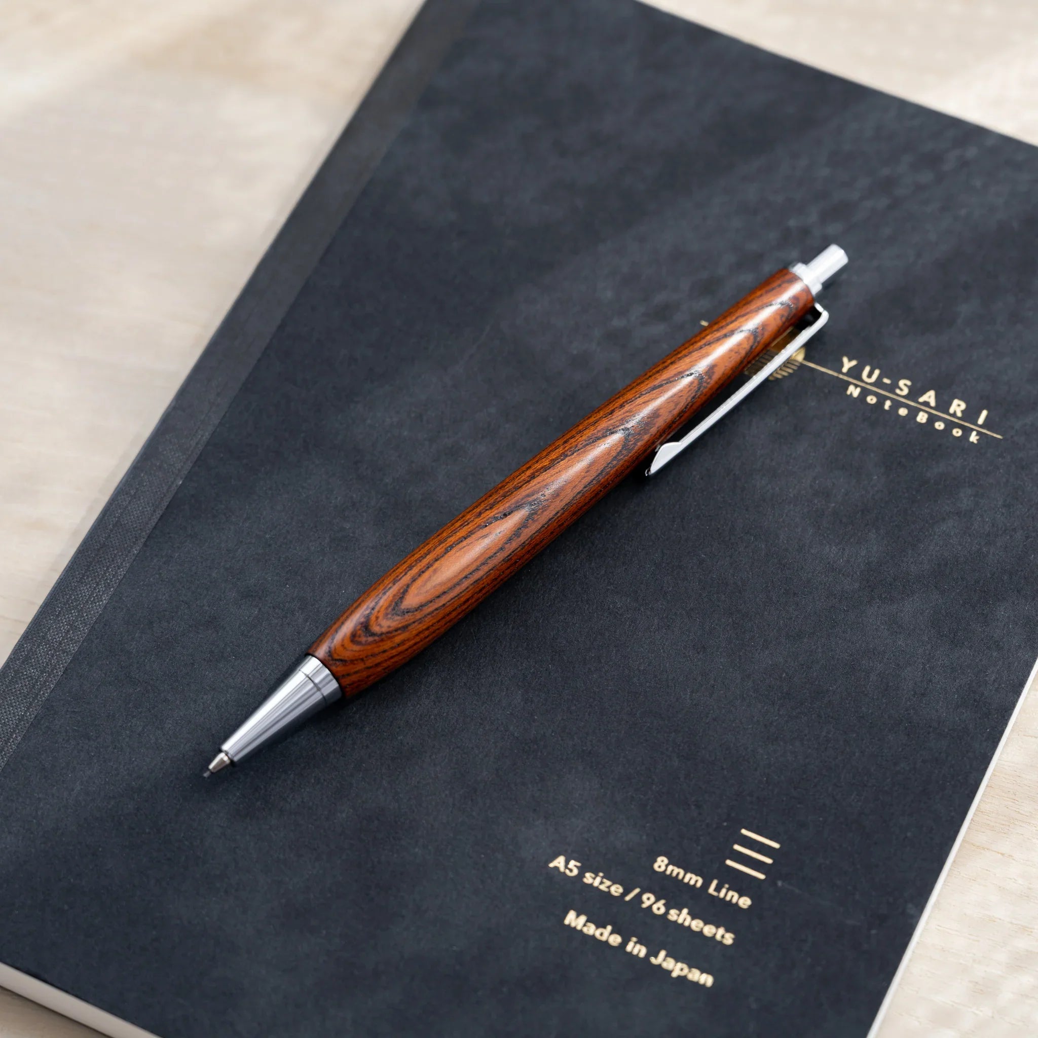 Zelkova wood urushi lacquered mechanical pencil in amber-brown, Japanese keyaki wood, silver knock, clip and tip