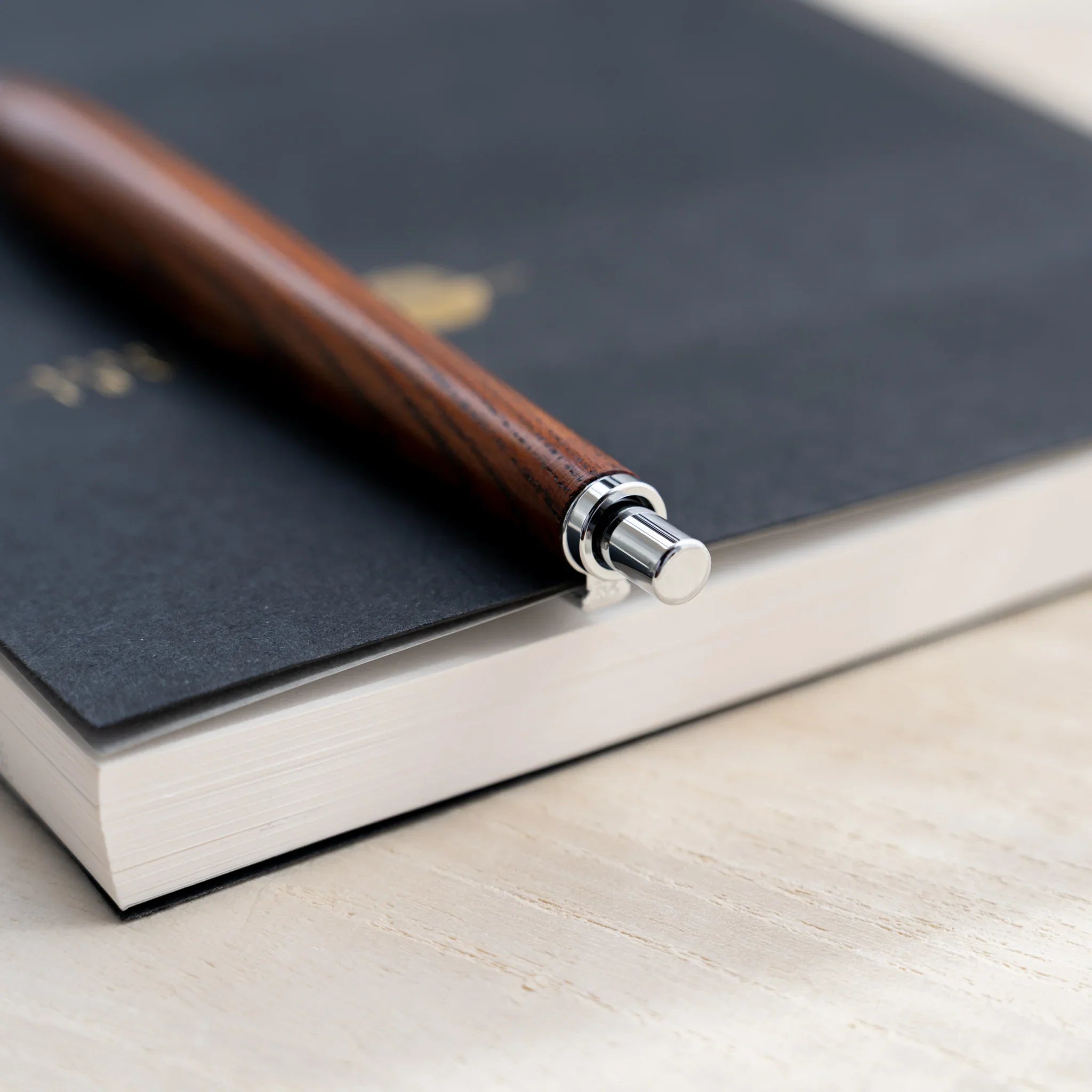 Zelkova wood urushi lacquered mechanical pencil in dark reddish-brown, Japanese keyaki wood, silver knock and clip
