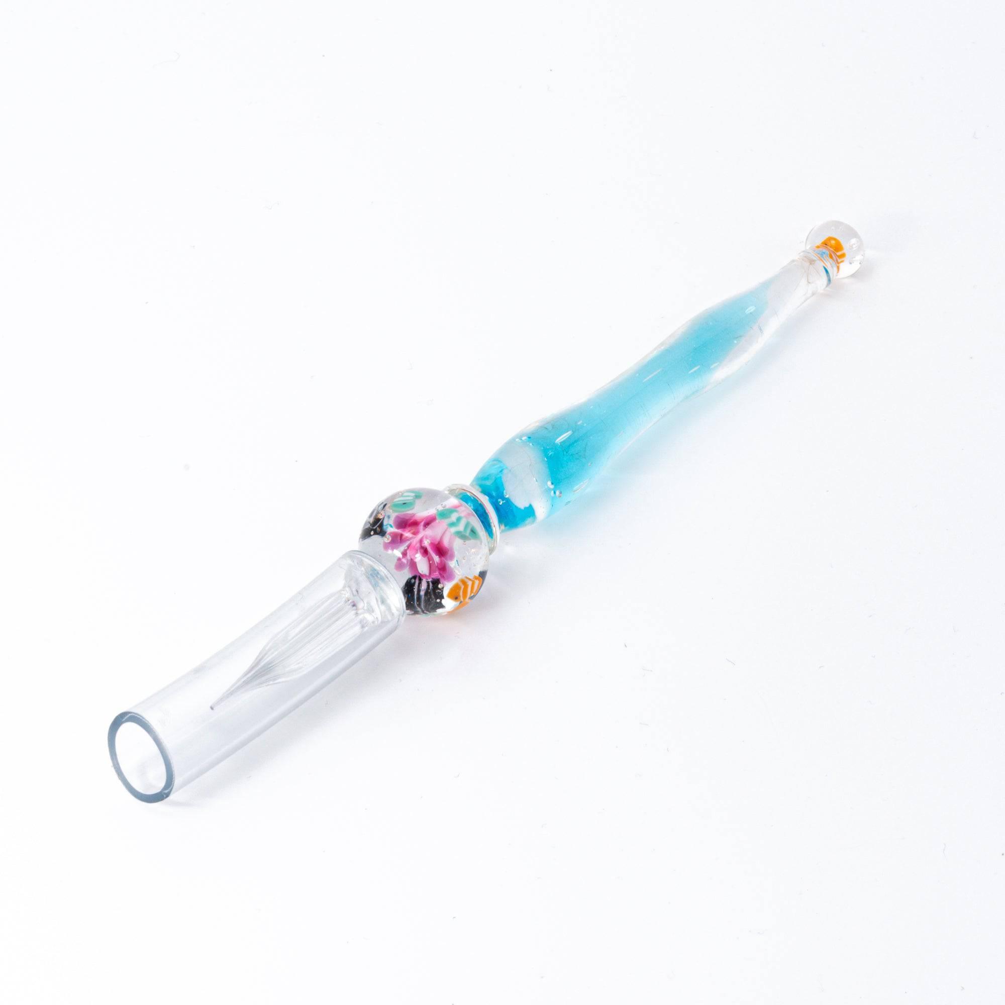 Full view of glass pen with clownfish and coral motifs, resembling an aquarium. Great for Japanese stationery enthusiasts.