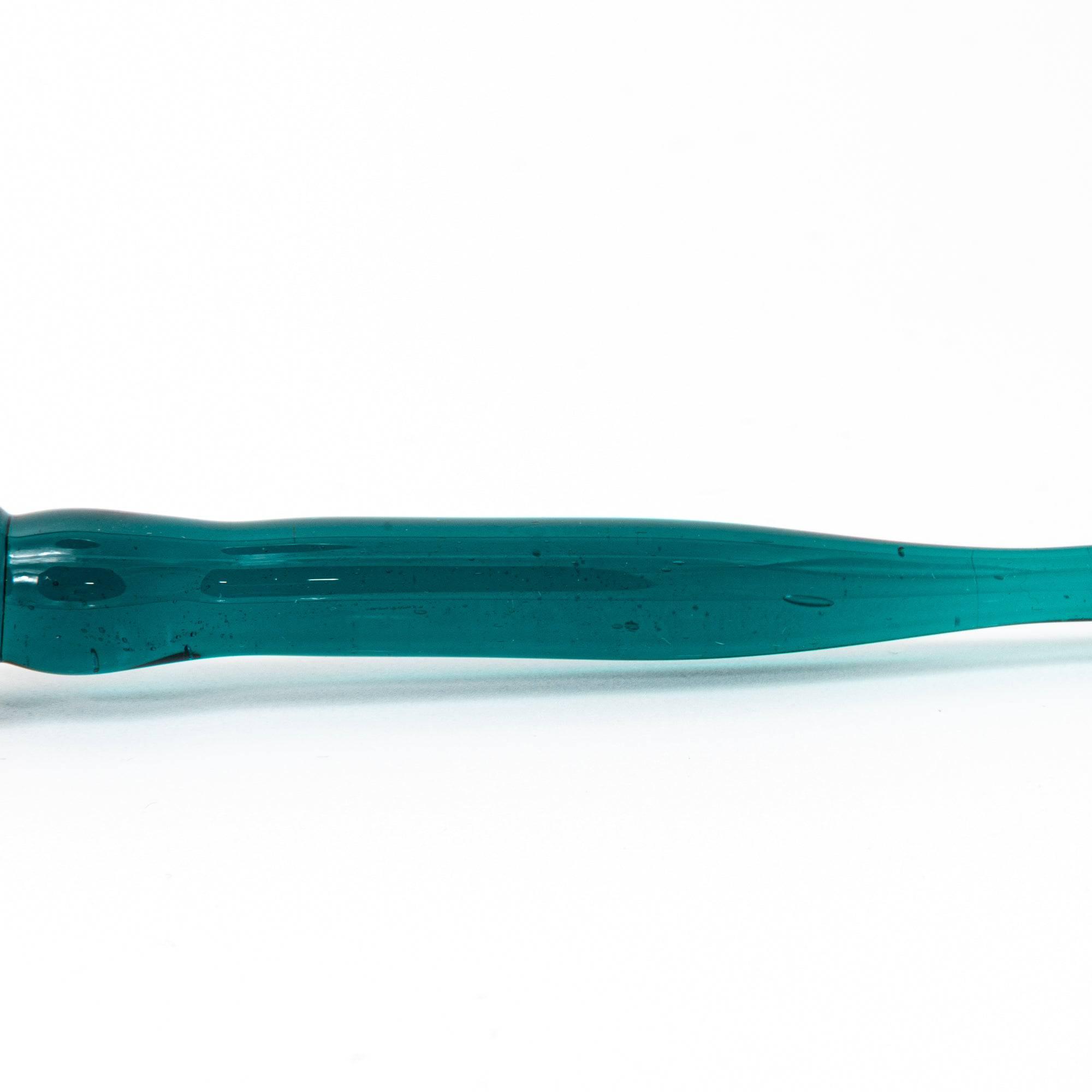 Side view of glass pen with goldfish motif encased like a fishbowl, featuring dark green handle.