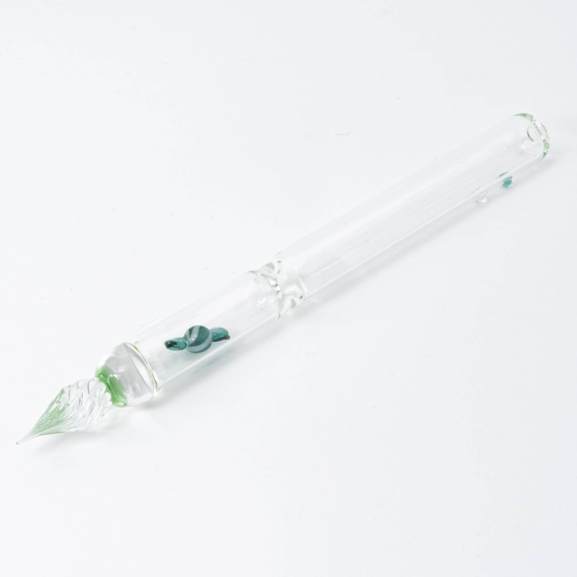 A Green candy motif is captured inside this elegant glass pen, offering a whimsical yet sophisticated design for any stationery enthusiast.