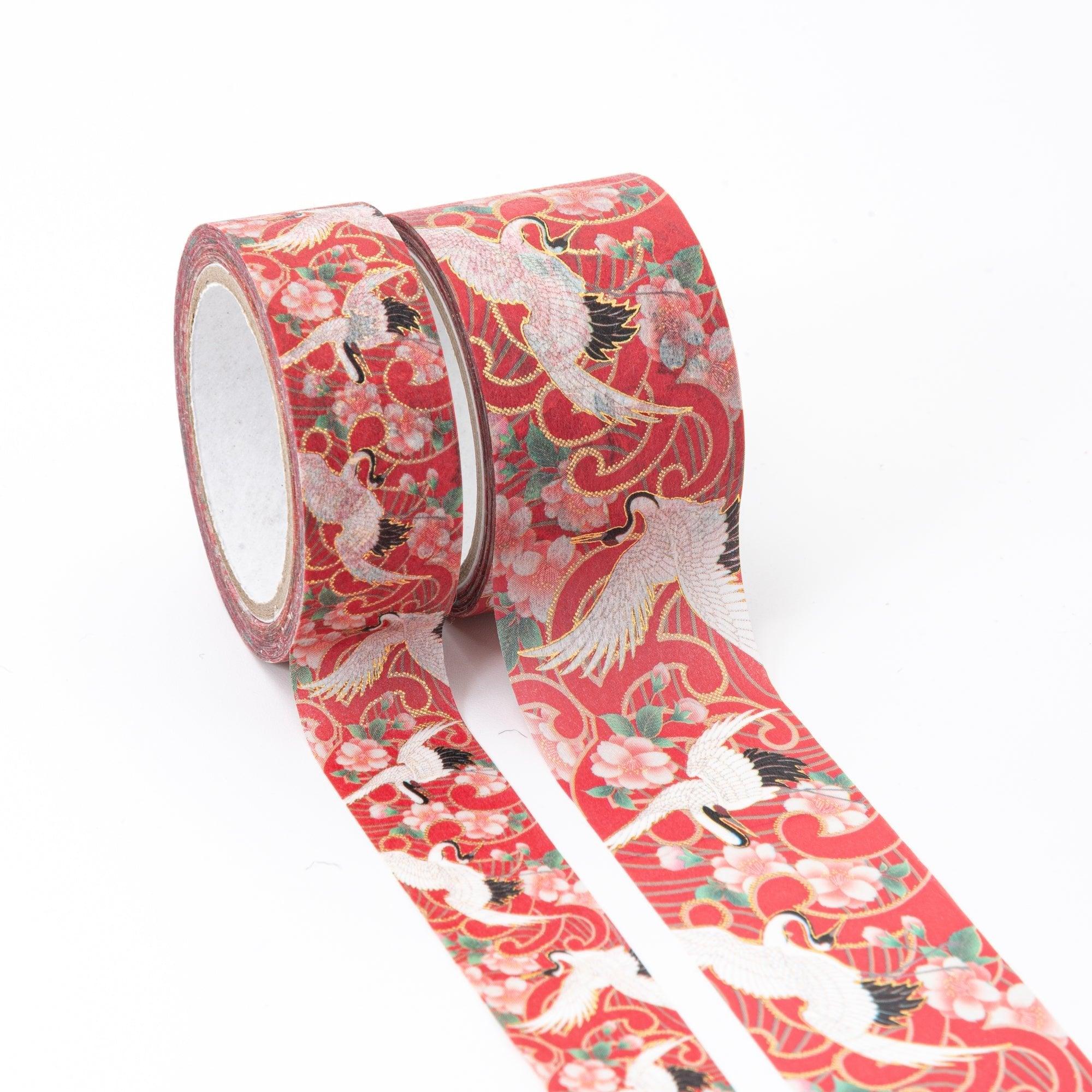 Kimono Beauty Series Iyo Washi Tape, showcasing graceful crane designs, arranged on a wooden desk under soft natural light.  