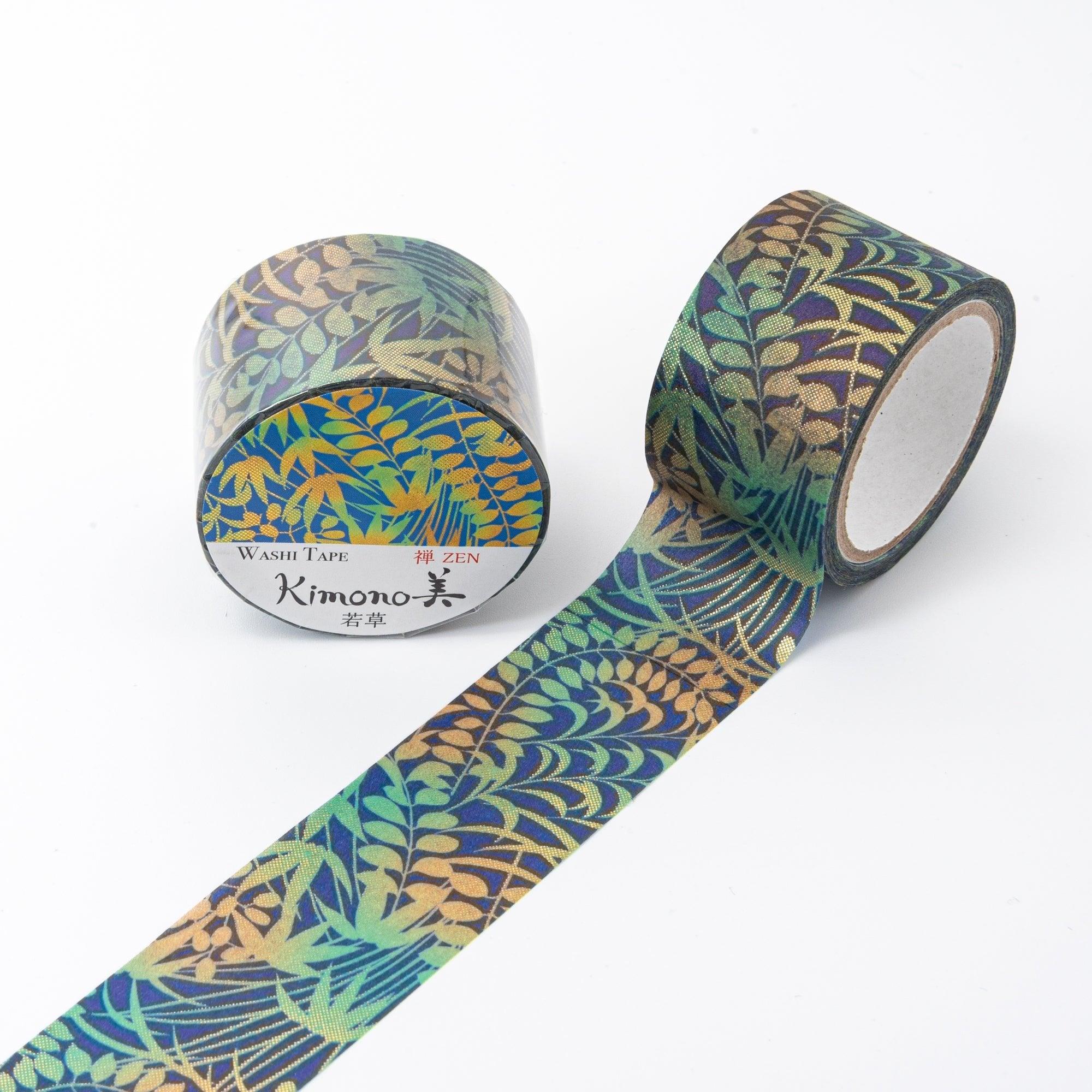 Iyo Washi Tape highlighting delicate grass-inspired designs, gracefully arranged on a wooden desk for an organic decorative touch.  