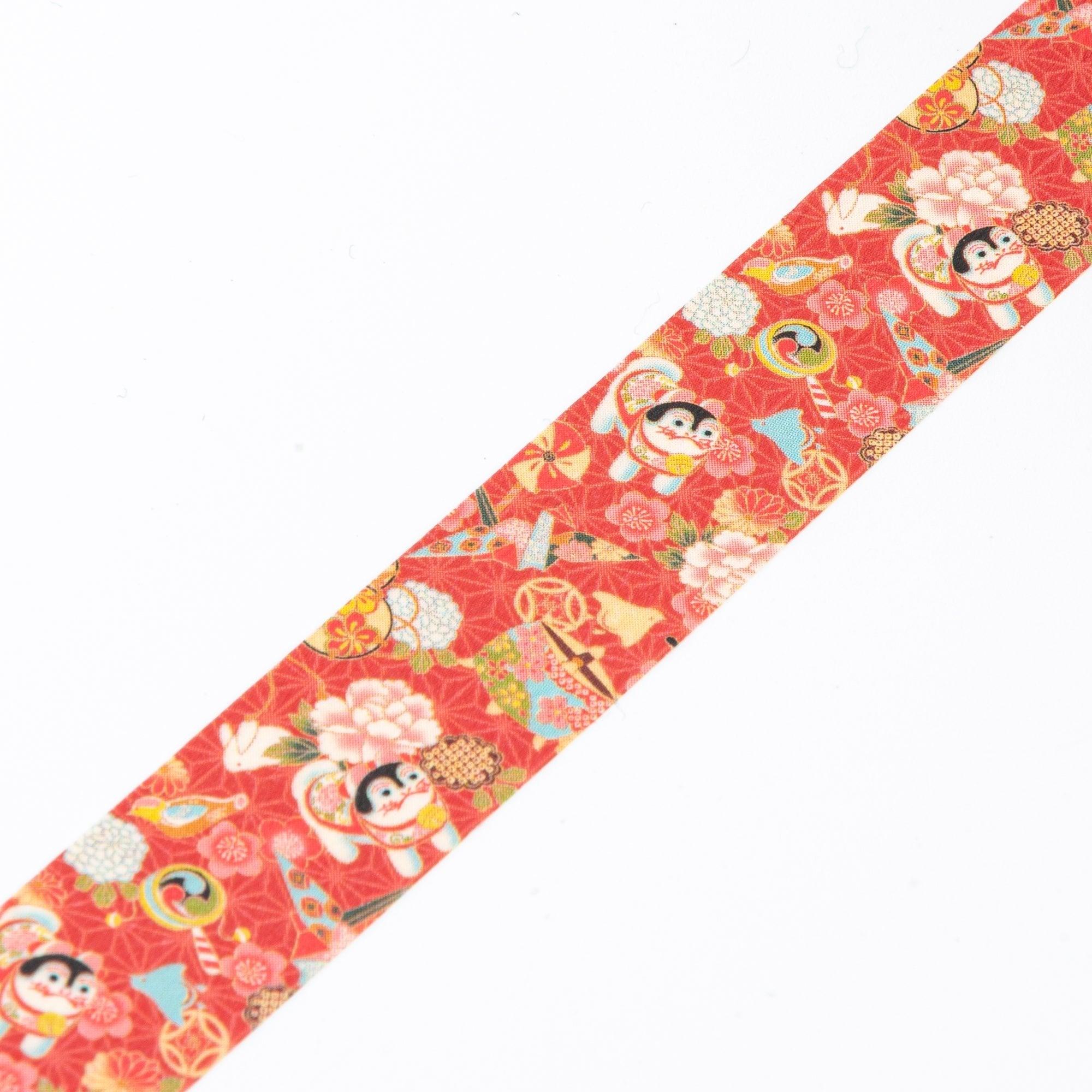 Close-up of Iyo Washi Tape showcasing intricate guardian dog patterns, emphasizing vibrant colors and cultural artistry.  