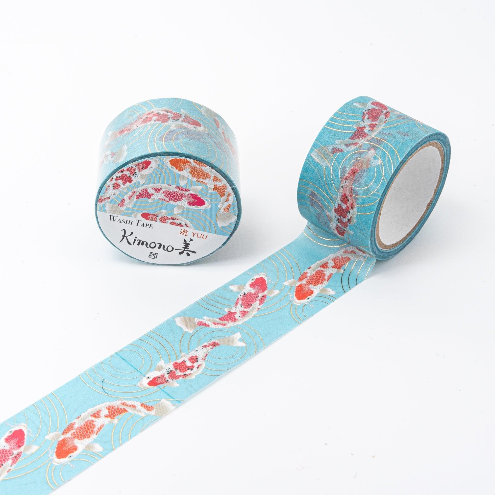 Iyo Washi Tape highlighting graceful koi fish swimming patterns, arranged beautifully on a desk with a natural wooden texture.  