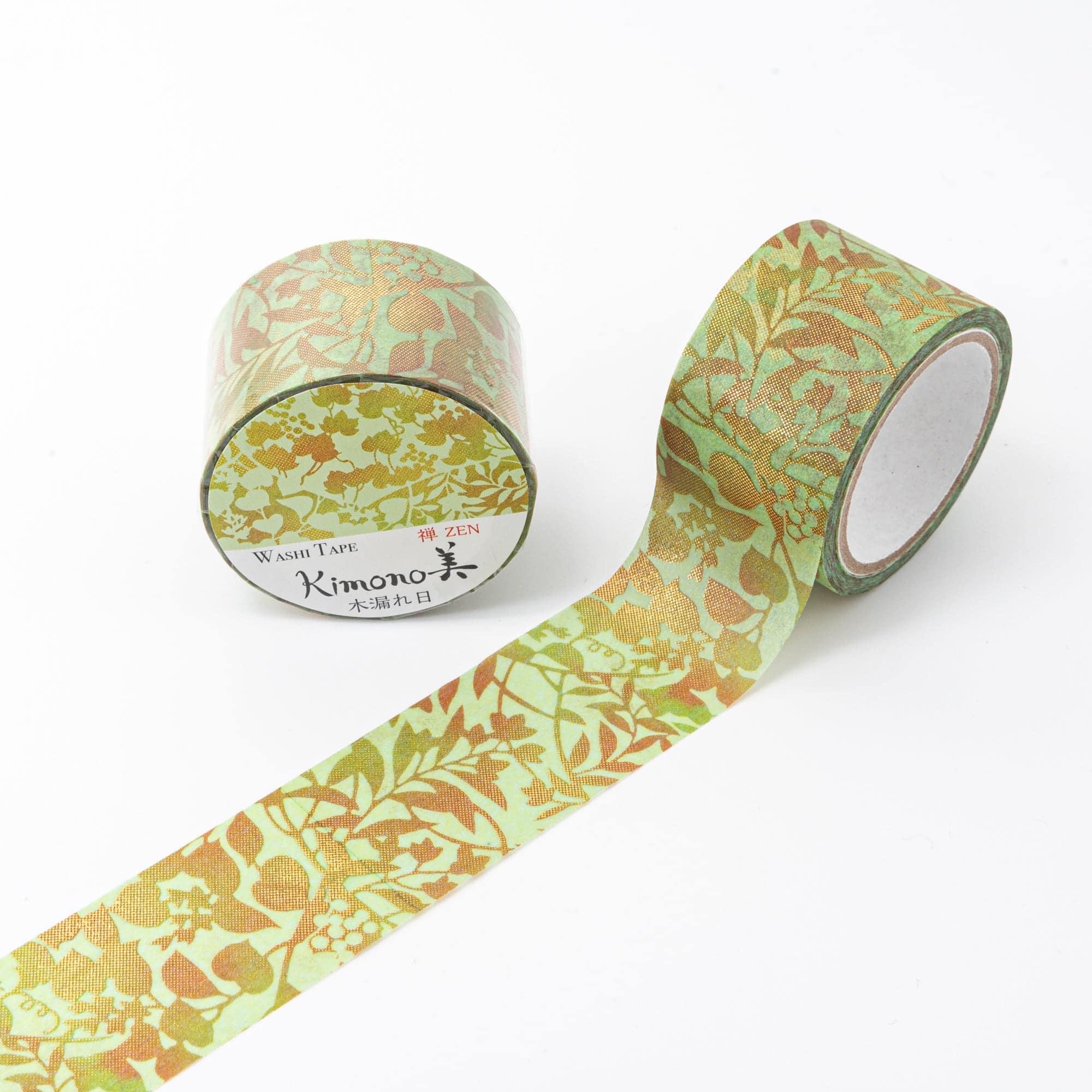 Iyo Washi Tape highlighting delicate Komorebi-inspired elements, gracefully arranged on a wooden surface for aesthetic appeal.  