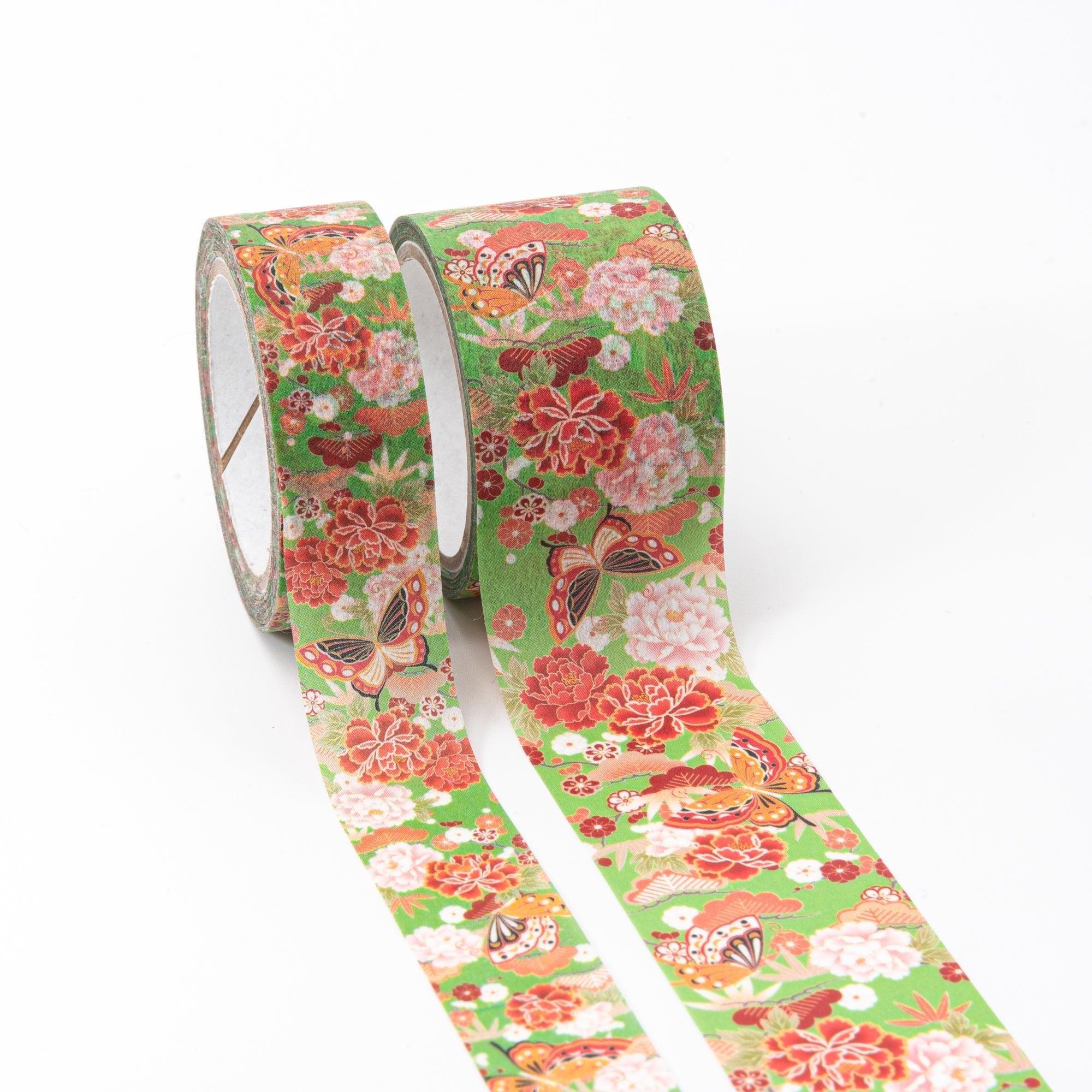 Kimono Beauty Series Iyo Washi Tape showcasing a harmony of butterflies and traditional floral motifs, placed on a wooden desk.  