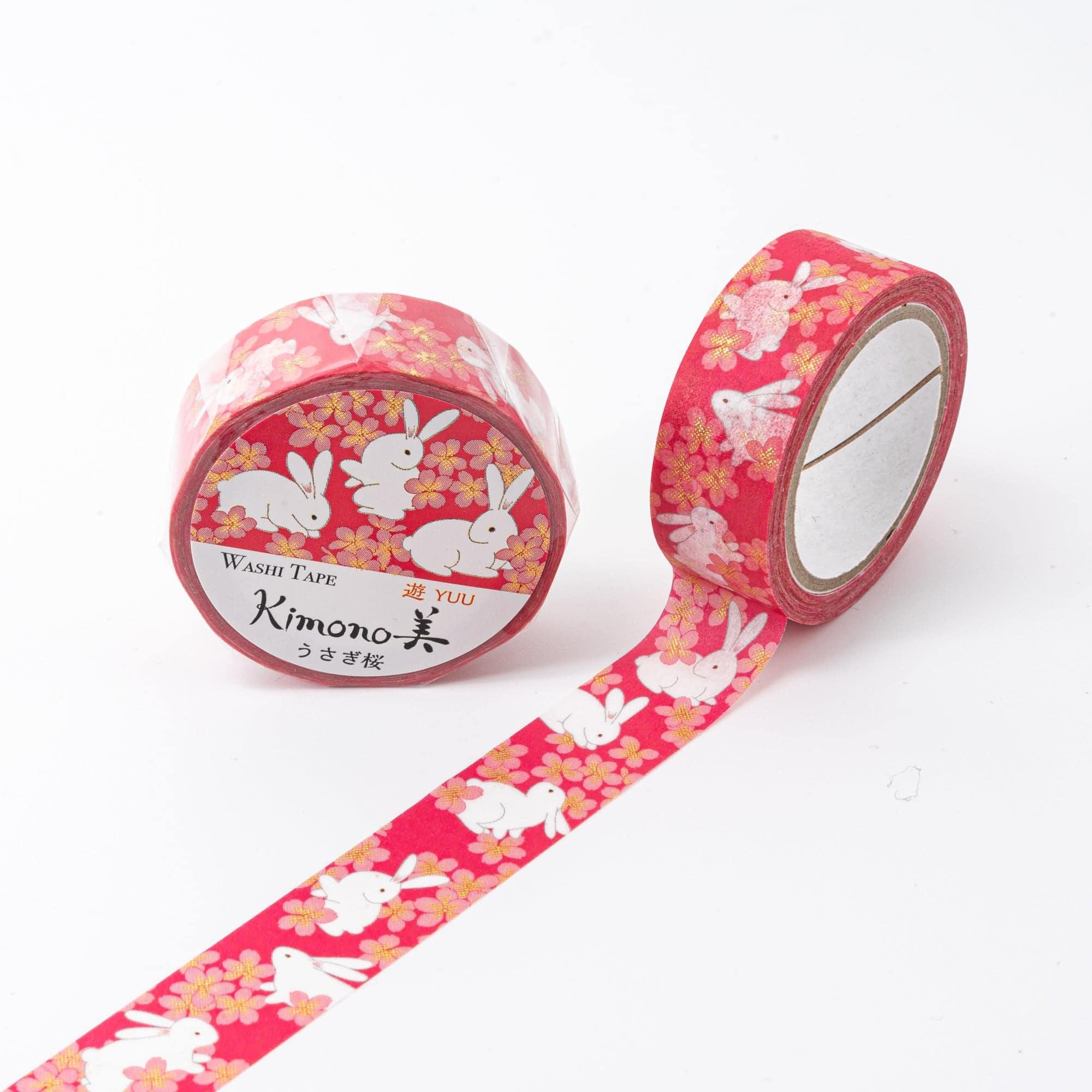 Kimono Beauty Series Iyo Washi Tape featuring sakura rabbits motifs, elegantly displayed on a wooden surface with playful charm.  