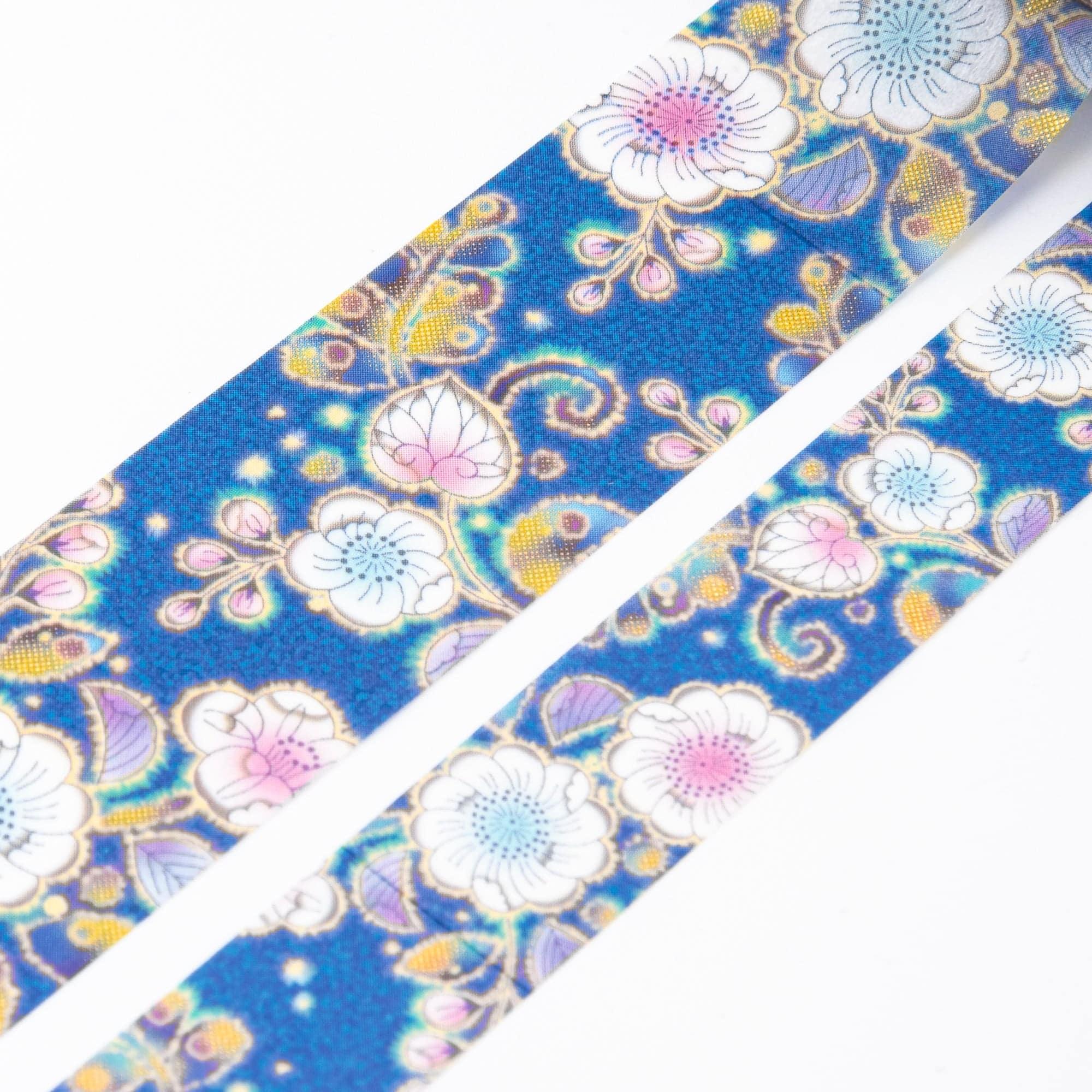 Close-up of Iyo Washi Tape showcasing delicate Tsujigahana bloom patterns with vibrant colors and intricate traditional design.  